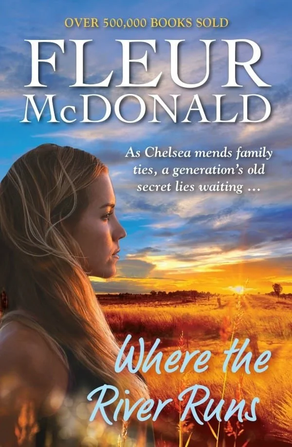 Book cover: Where the River Runs by Fleur McDonald. A woman looks wistfully over a wheat paddock