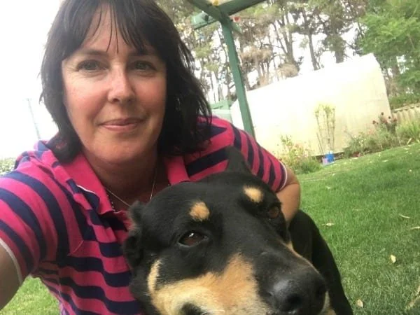 Fleur takes a selfie with Jack, a beautiful black kelpie with tan on his face.