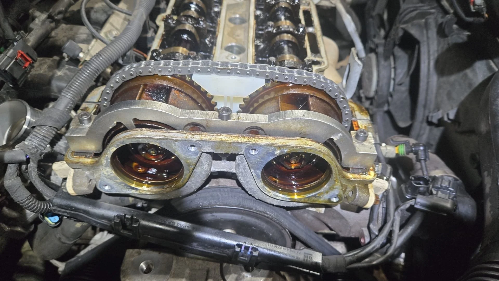 Half way process of a timing chain being replaced at premier tyres spondon