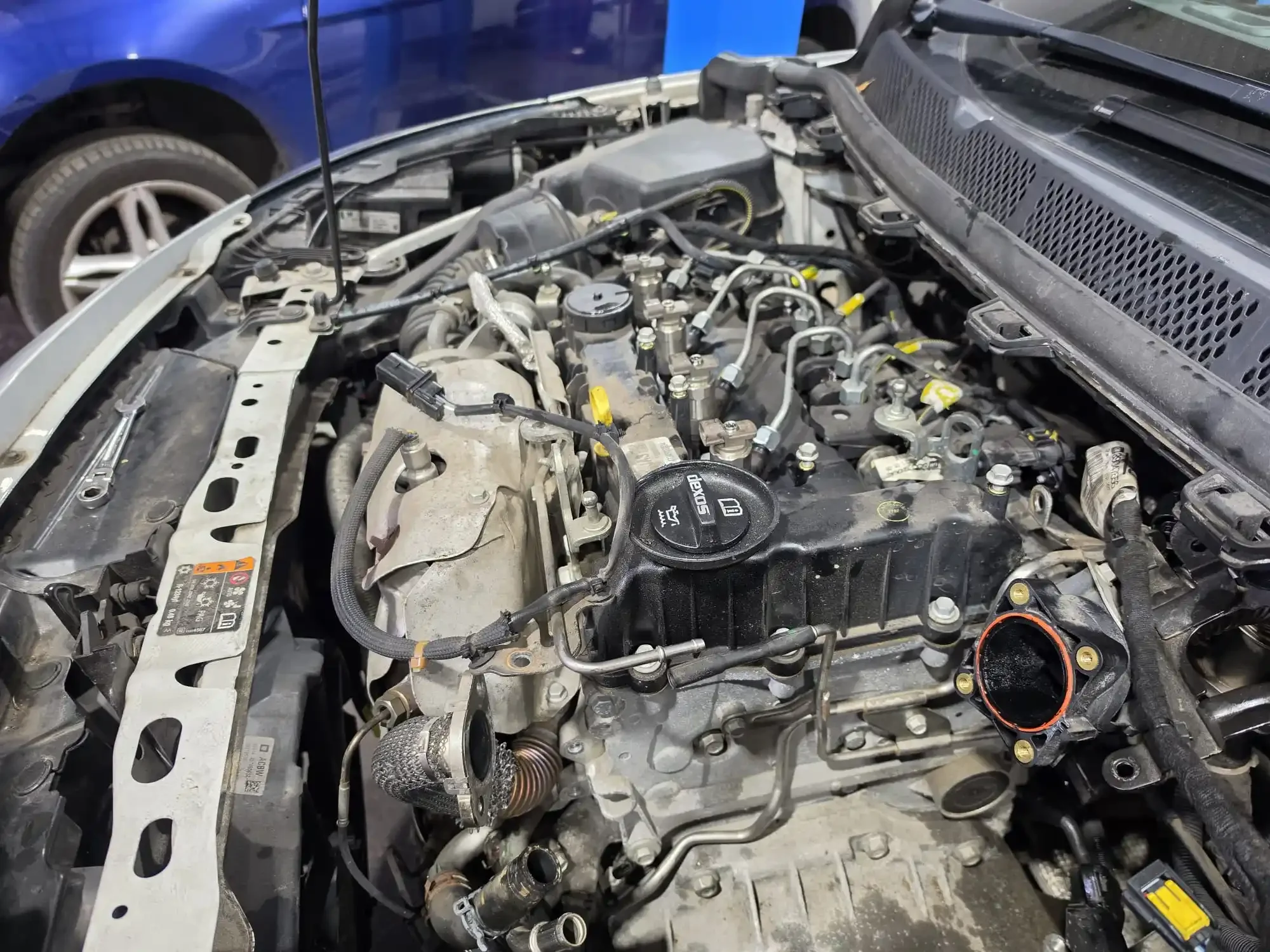 Engine undergoing timing chain replacement at Premier Tyres Spondon