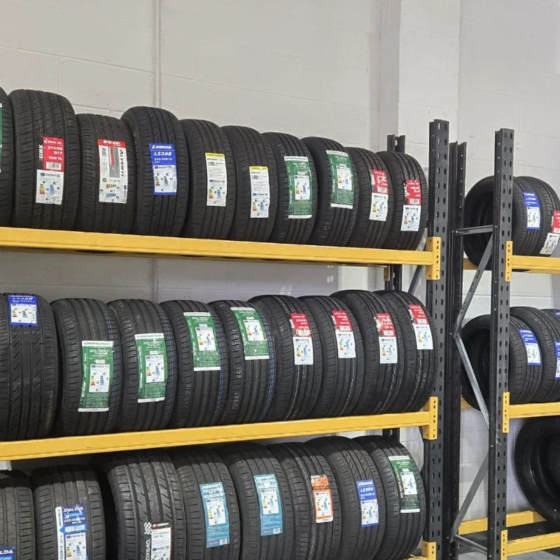 Selection of car and van tyres displayed in a garage