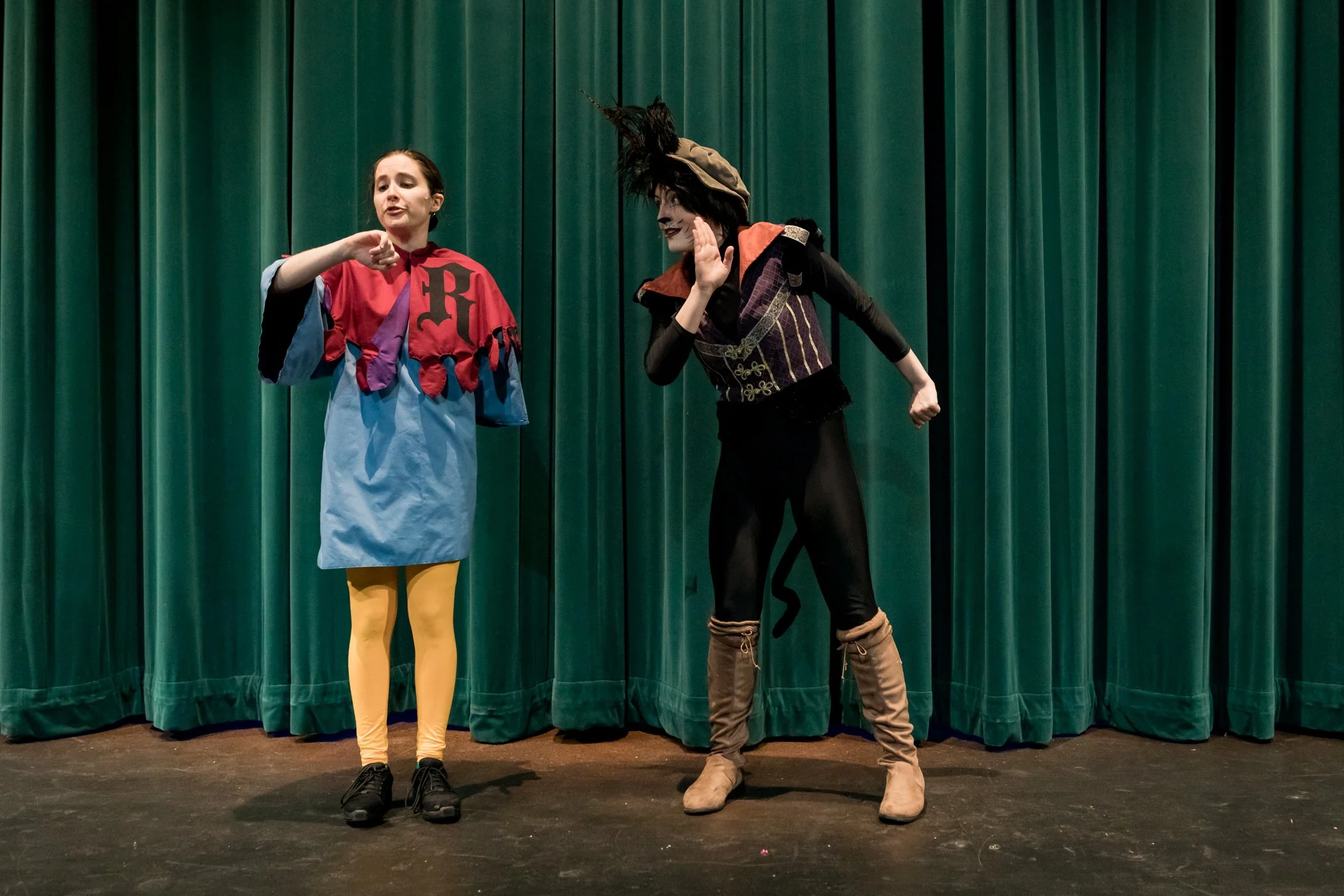 Kaira (right) as Puss in Boots in Centerstage Theatre's "Puss in Boots"
