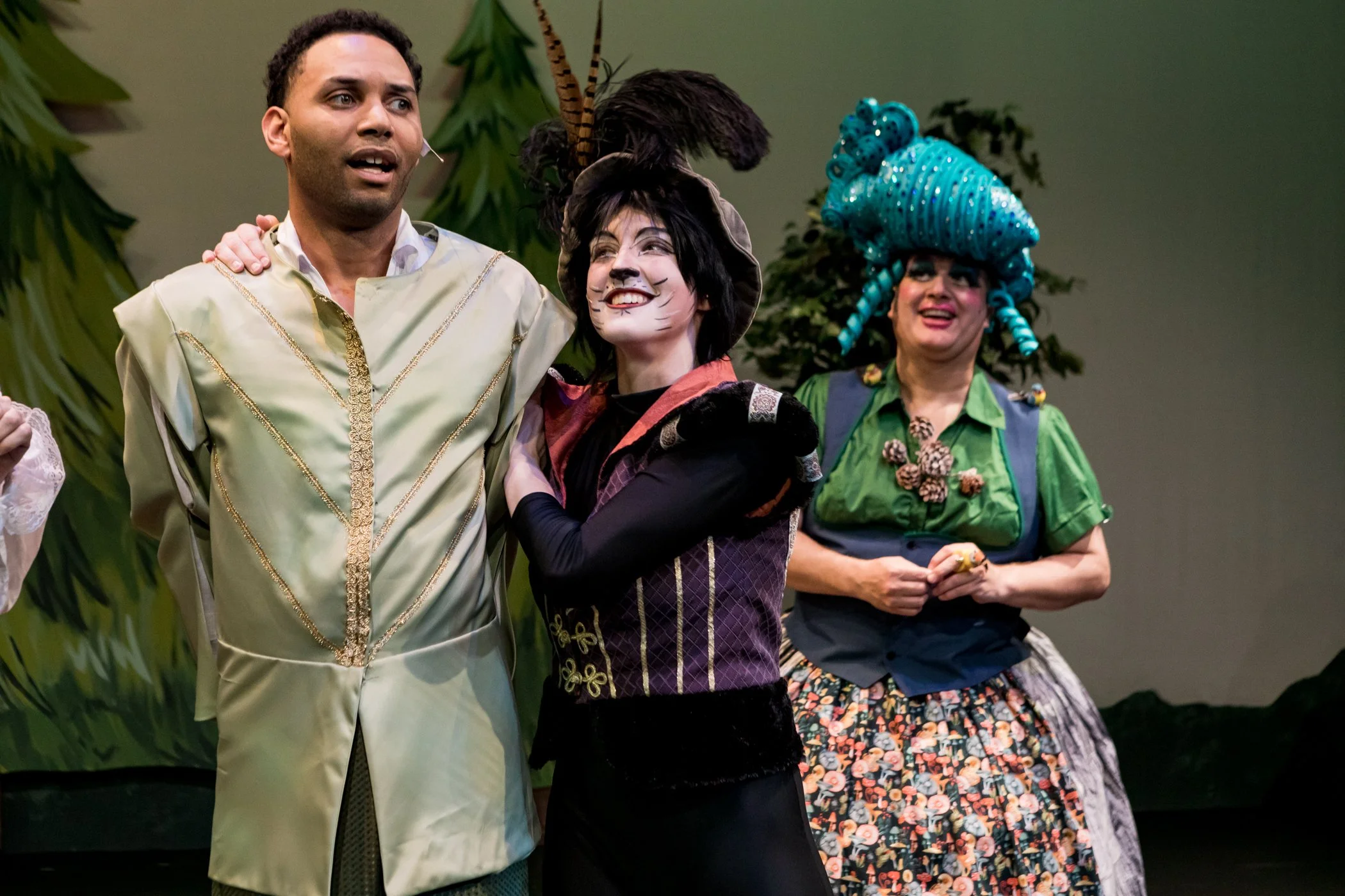 Kaira (center) as Puss in Boots in Centerstage Theatre's "Puss in Boots"