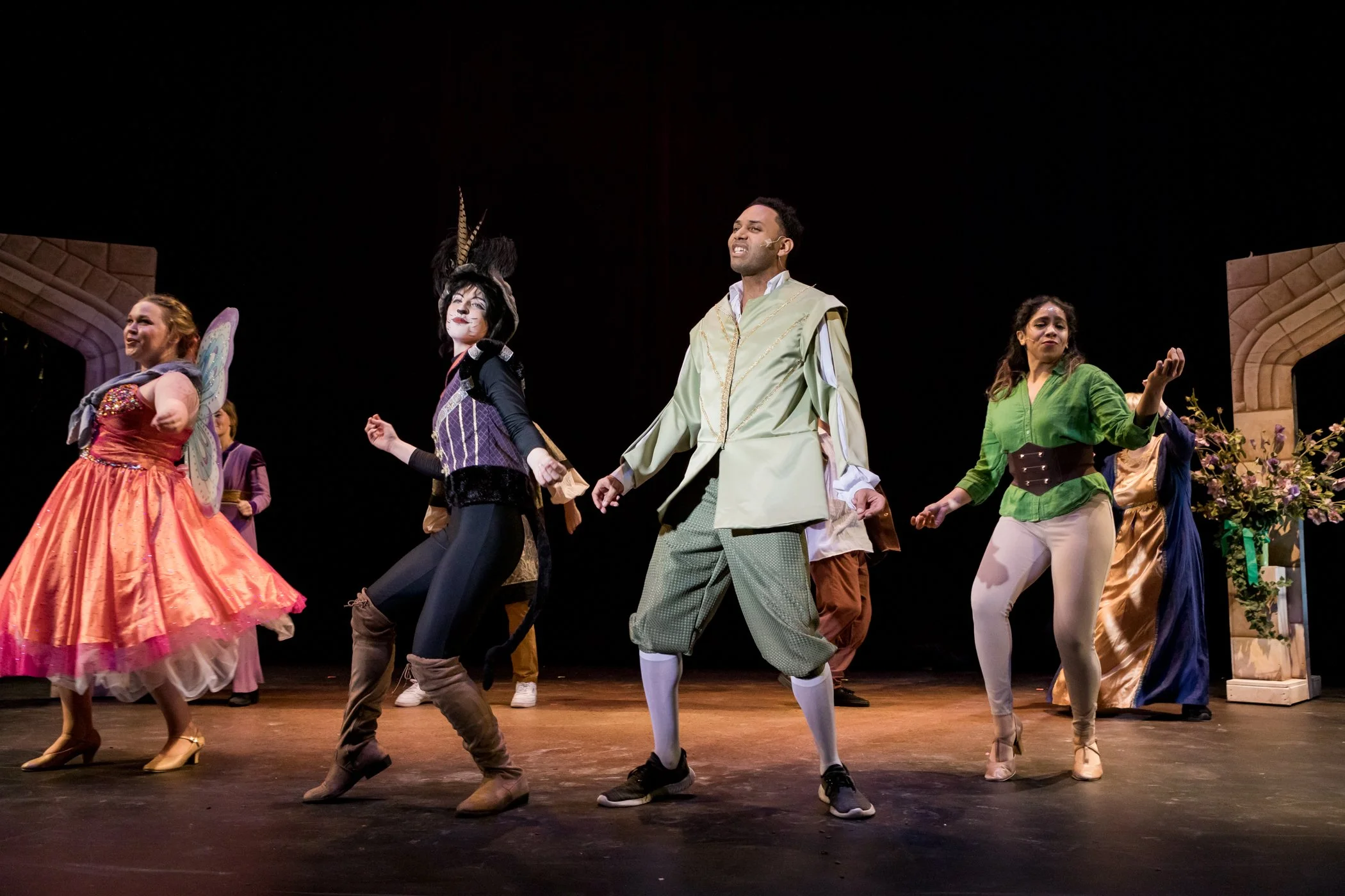 Kaira (center left) as Puss in Boots in Centerstage Theatre's "Puss in Boots"