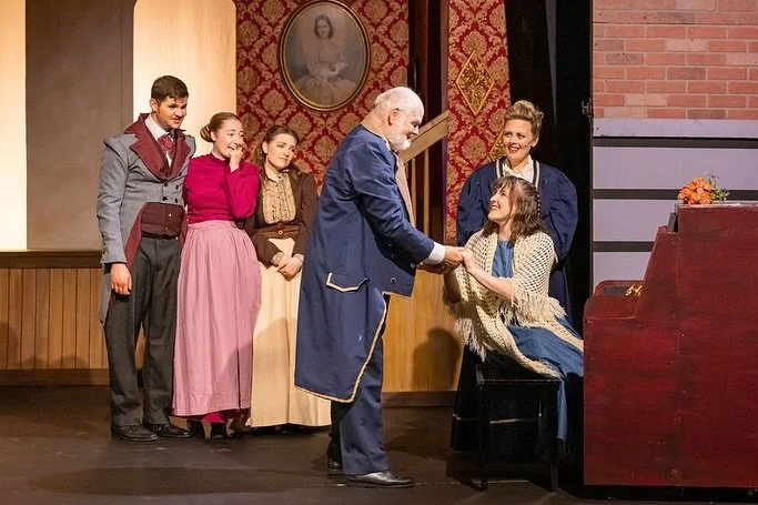 Kaira (in blue) as Beth in Renton Civic Theatre's "Little Women"