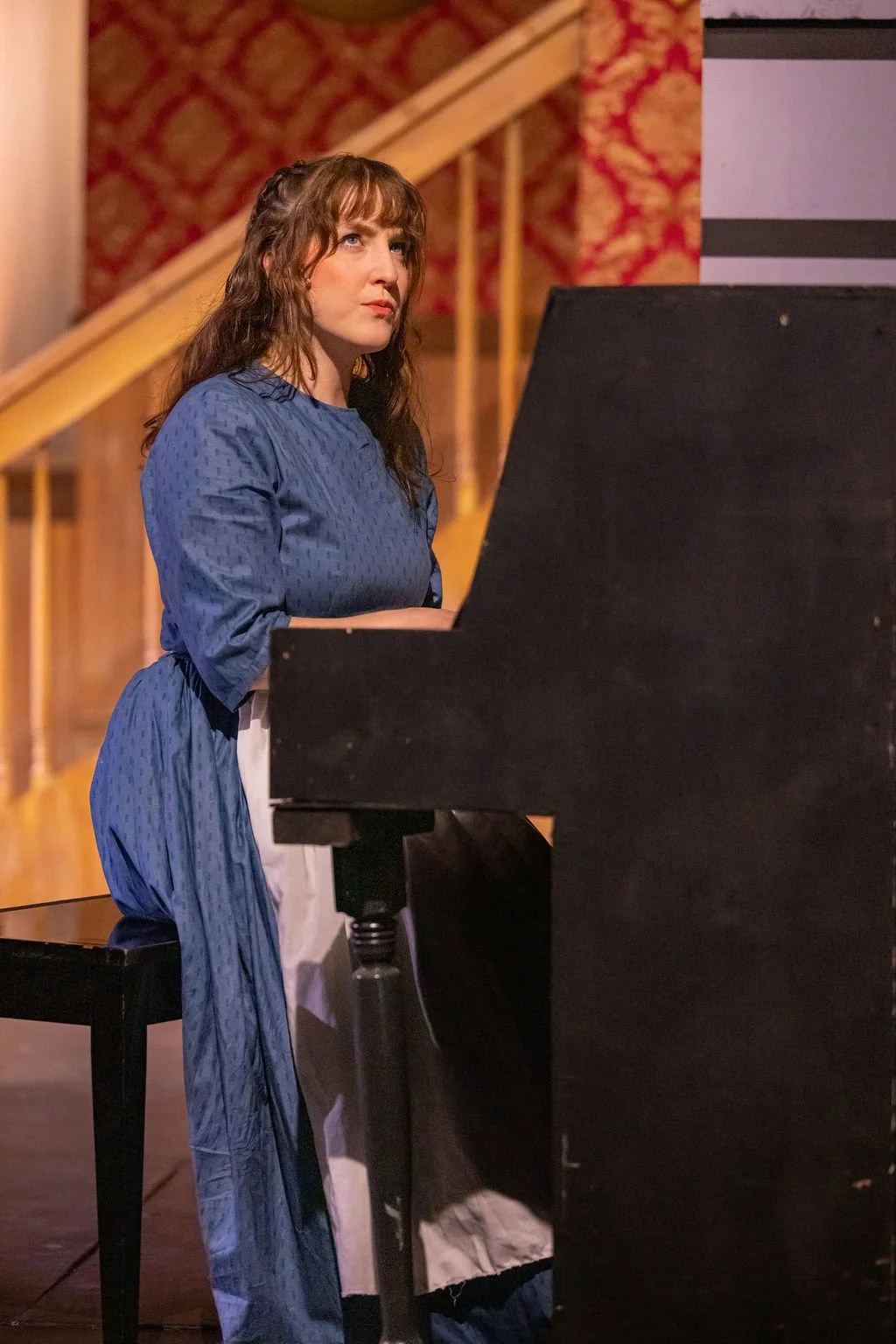 Kaira (in blue) as Beth in Renton Civic Theatre's "Little Women"