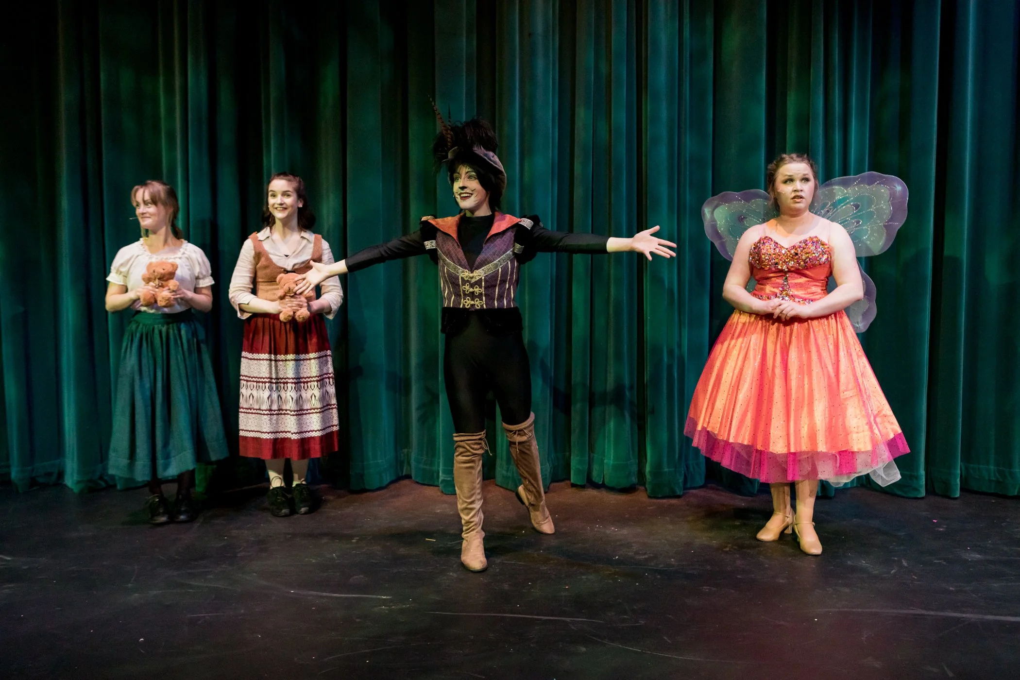 Kaira (center) as Puss in Boots in Centerstage Theatre's "Puss in Boots"