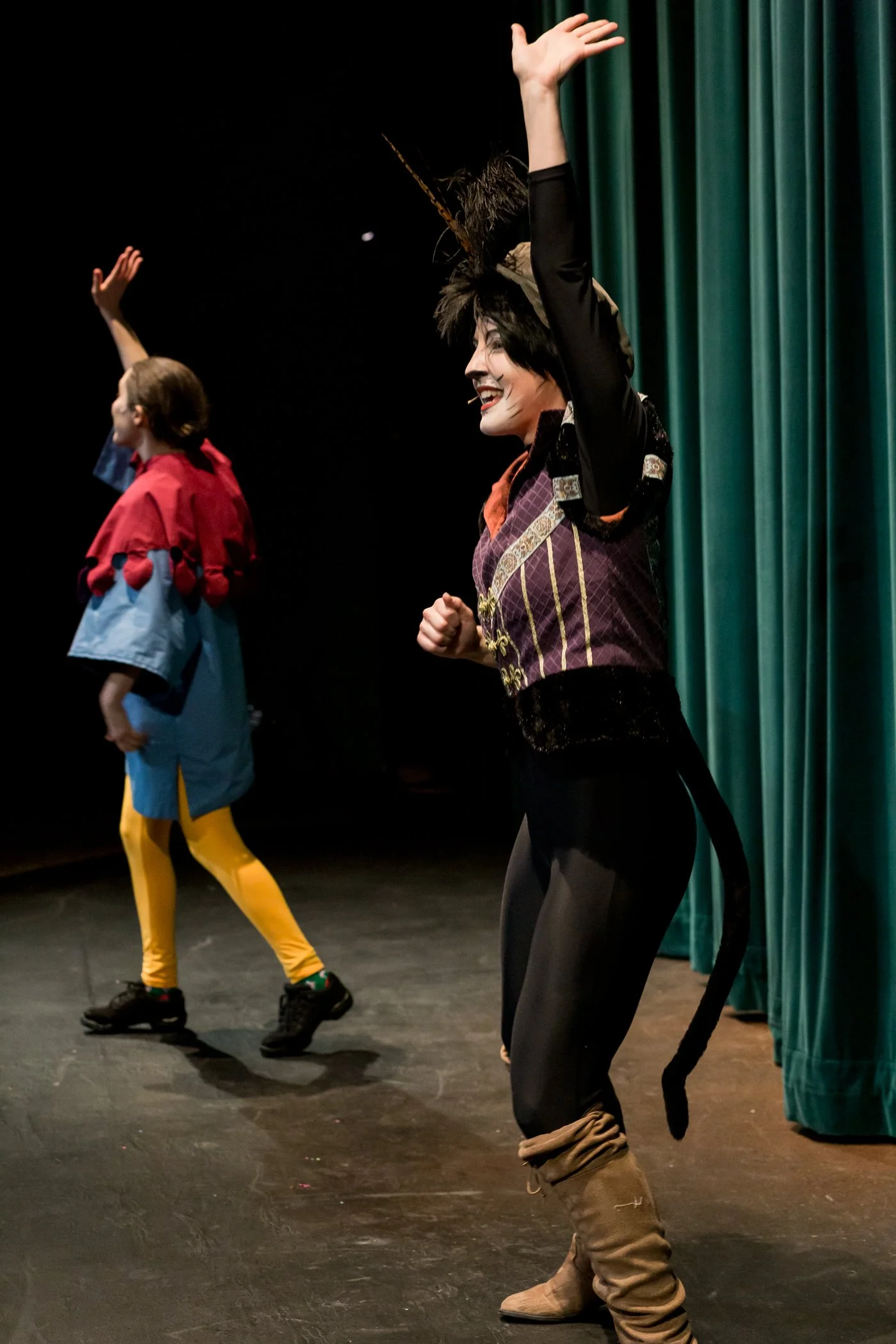 Kaira (right) as Puss in Boots in Centerstage Theatre's "Puss in Boots"