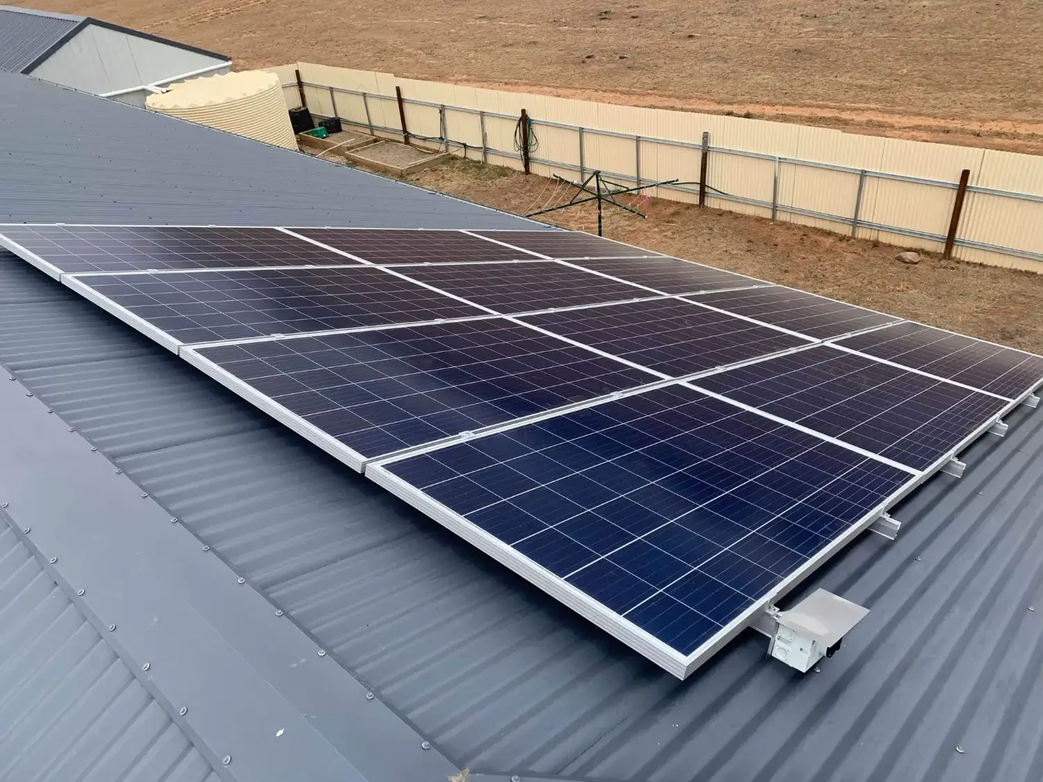 Solar panels installed on a metal roof.