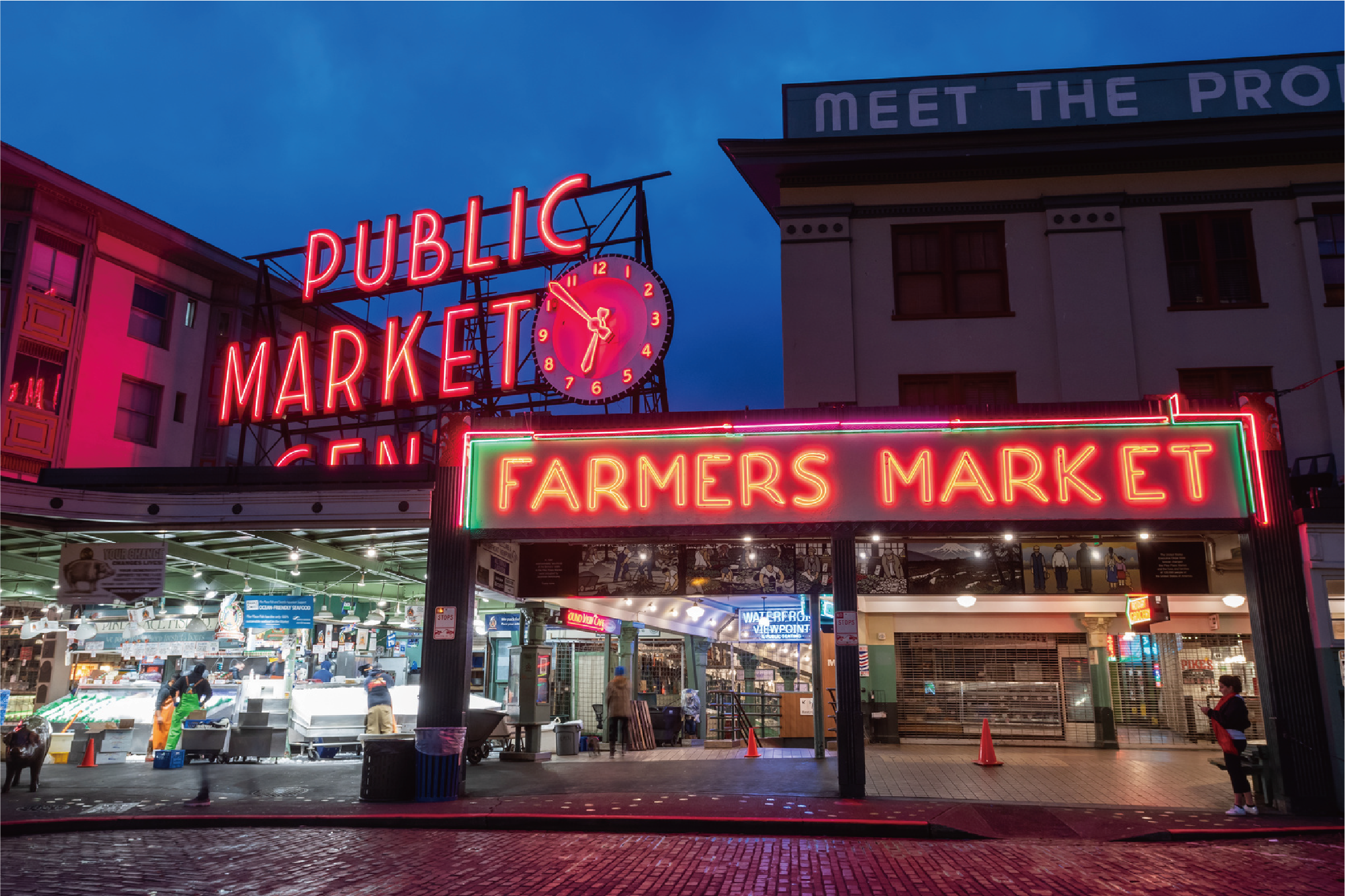 Iconic neon sign for a Public Market at night, representing local community, real-world connections, and authentic audience engagement in influencer marketing.