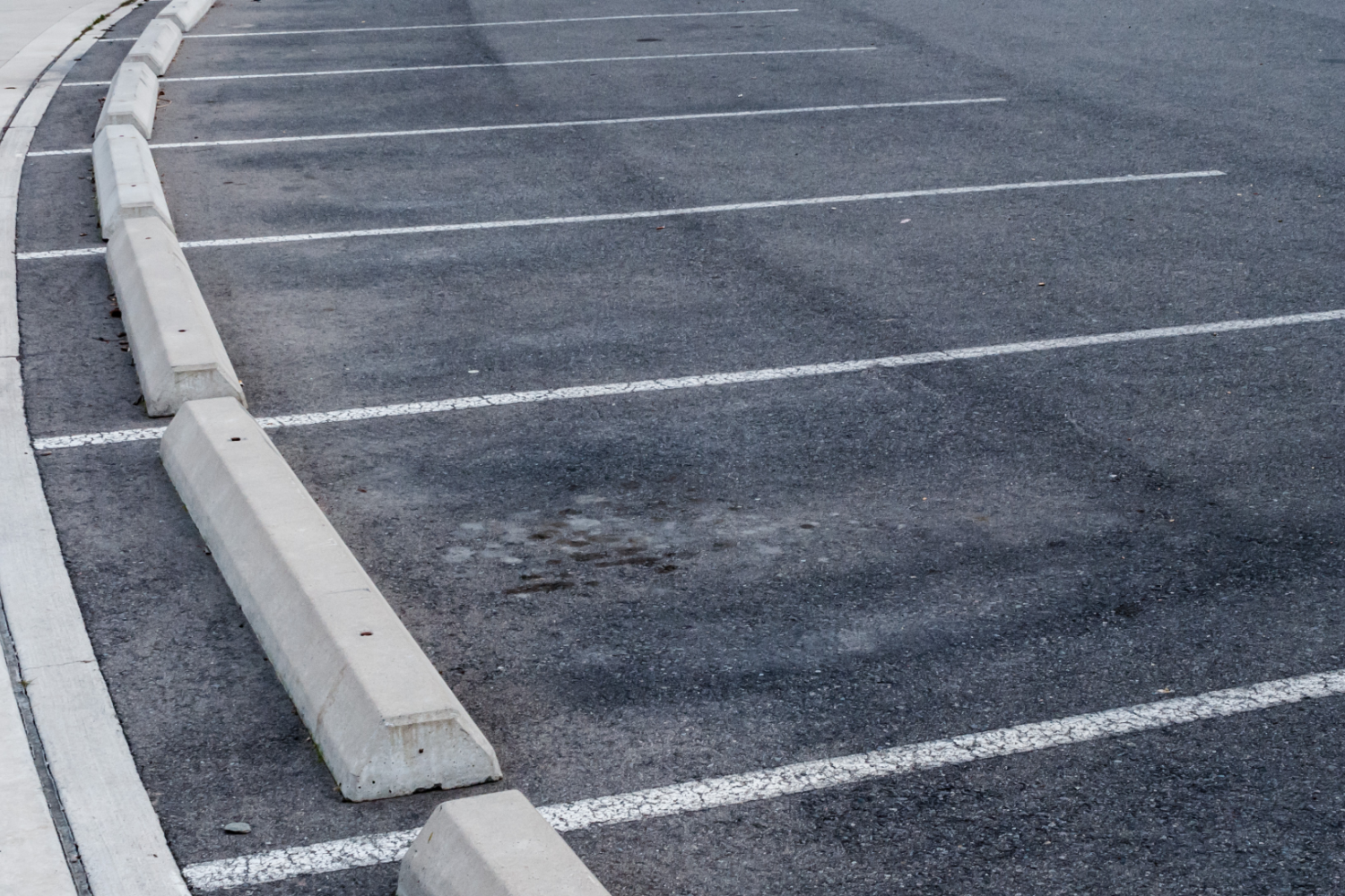 Parking Lot Resurfacing vs Full Replacement: How to Choose the Right Solution for Long Term Value