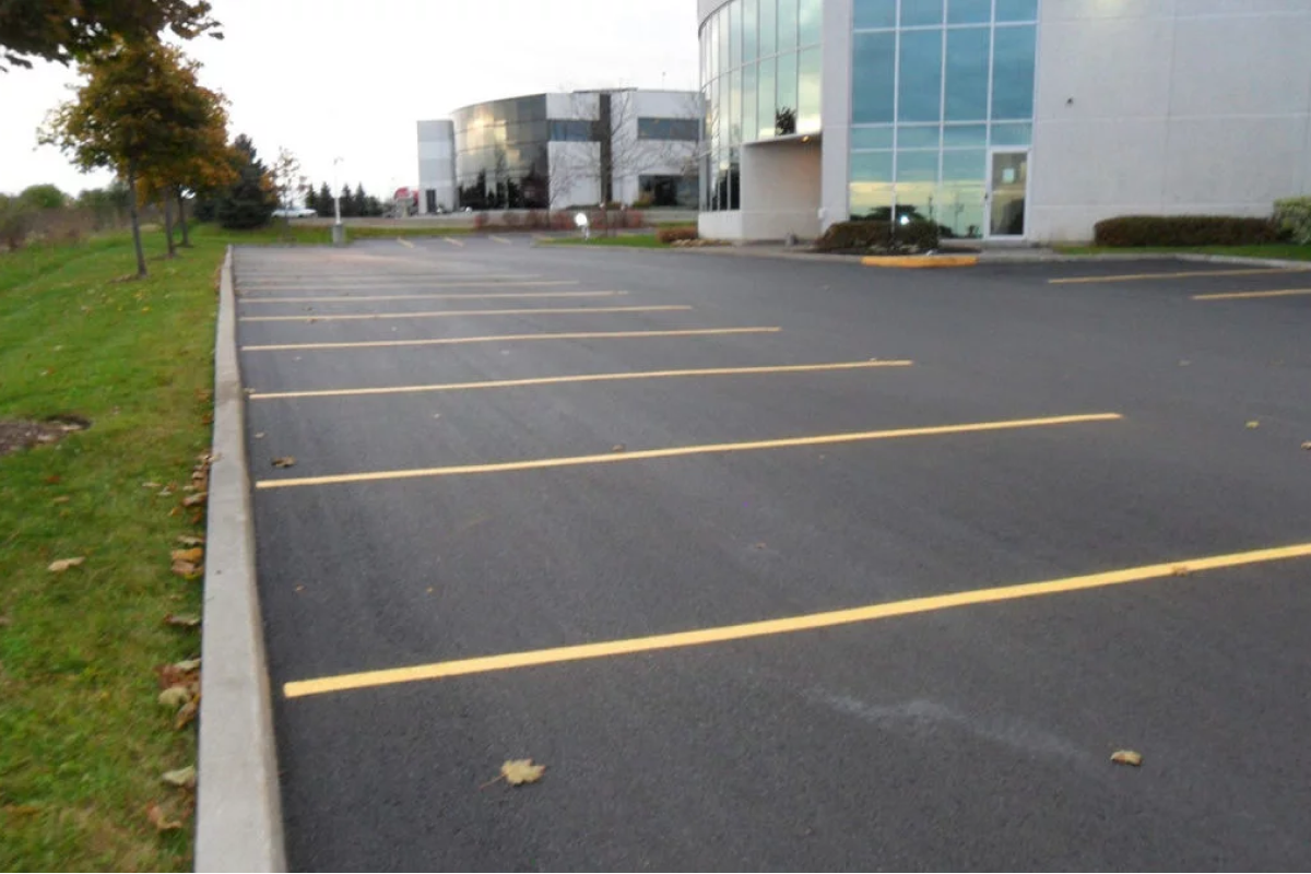How Asphalt Resurfacing Enhances Curb Appeal and Safety