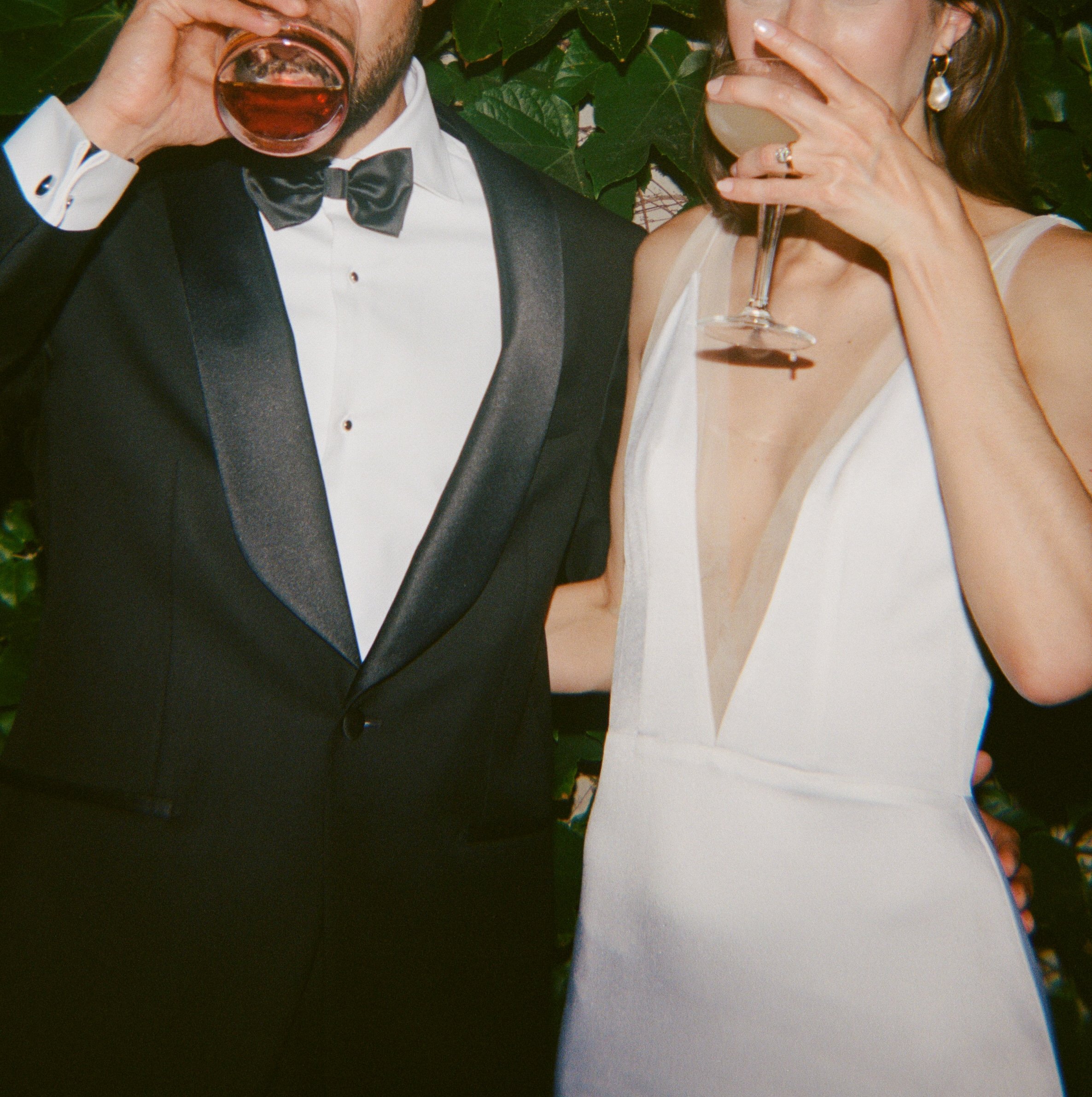 Bride and groom film photos at Charcoal Factory Loft
