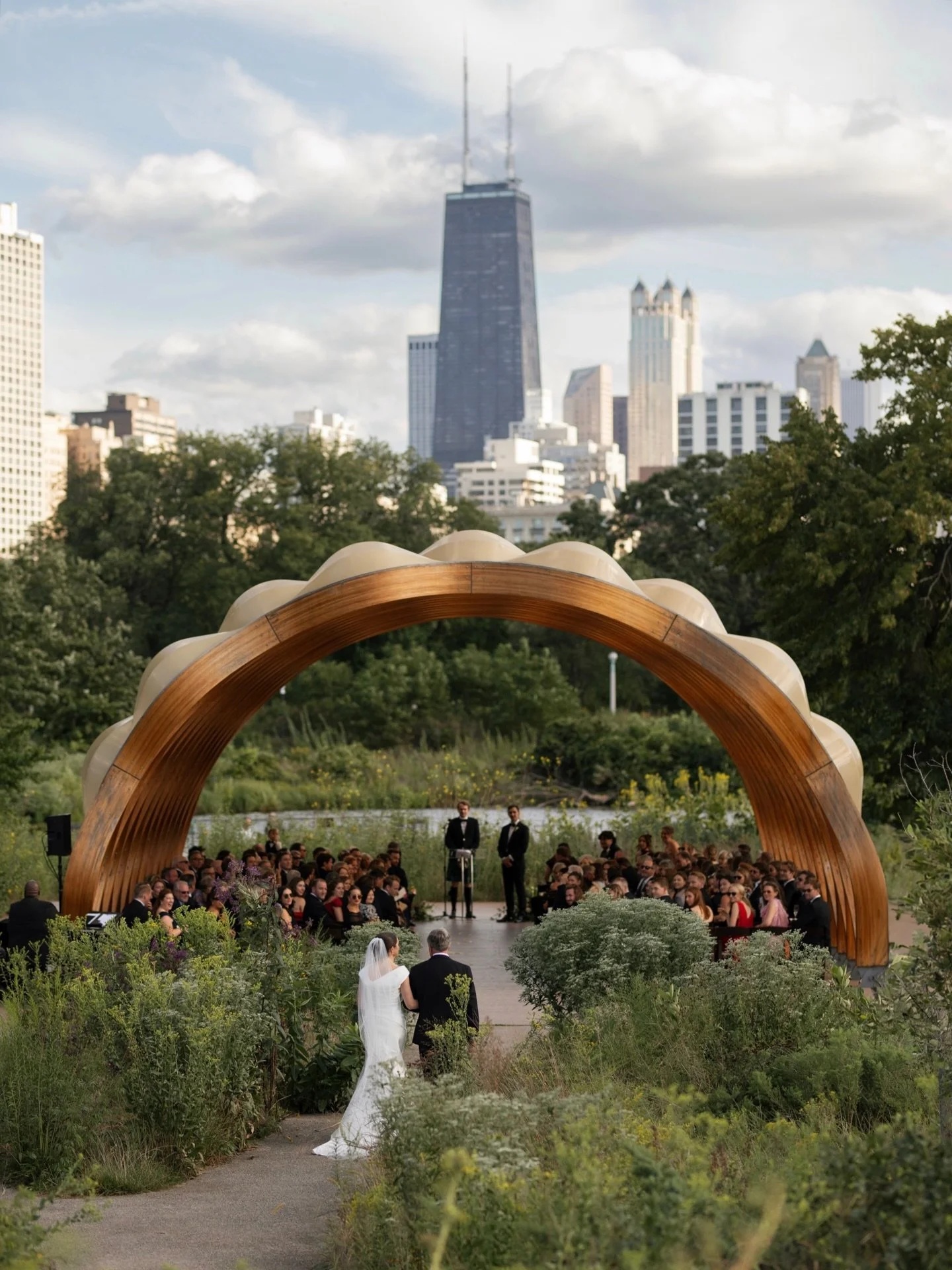 Something different about an outdoor ceremony, wouldn&rsquo;t you say? 

Venue: @tigerlilyevents 
Planning: @plan_and_gather_events 
Floral: @f4dweddings 
Makeup: @joeysoluvly 
Dress: @vwidon 

chicago wedding
chicago wedding photographer 
film weddi