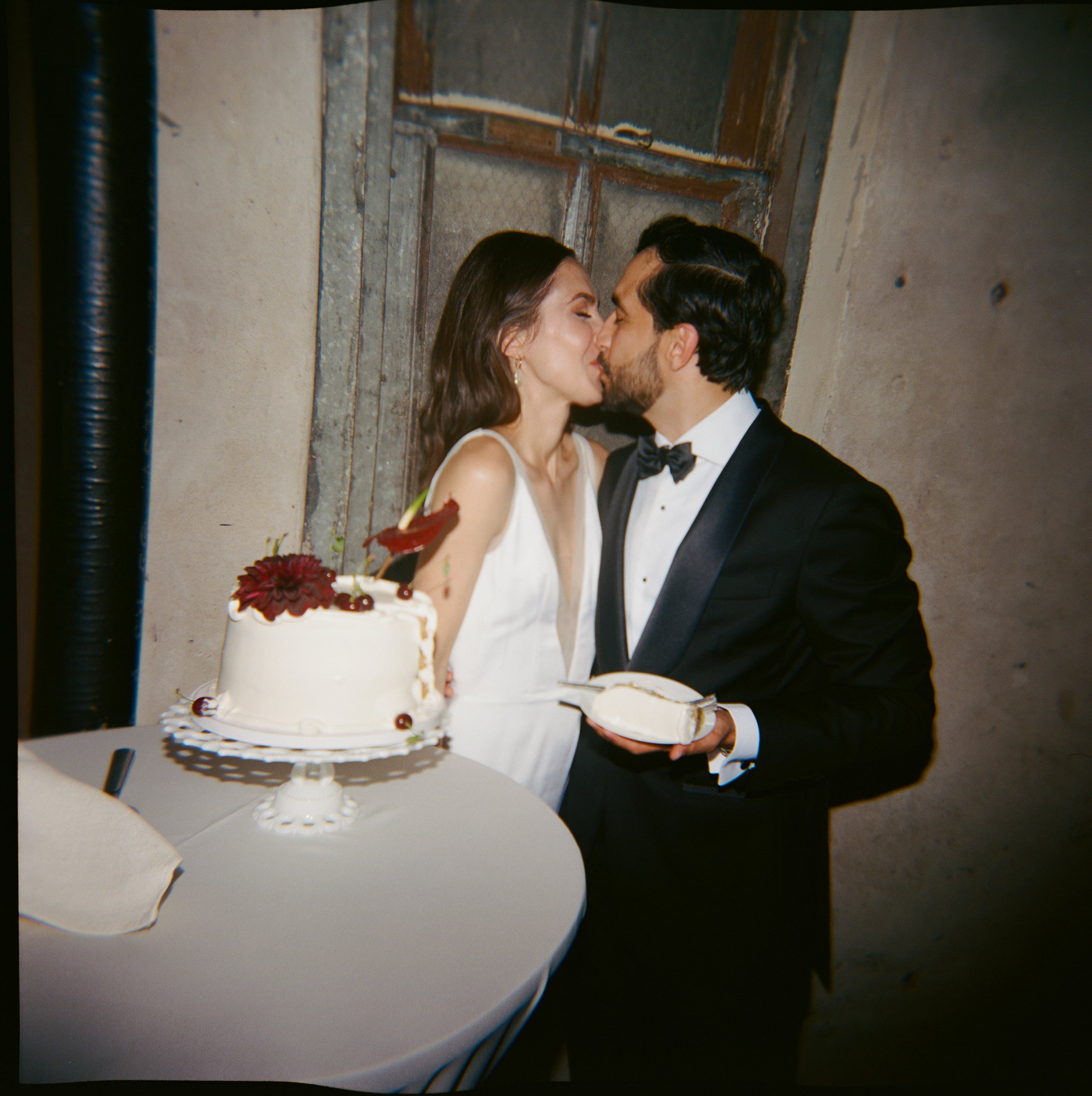 Cake cutting at Charcoal Factory Loft intimate wedding venue