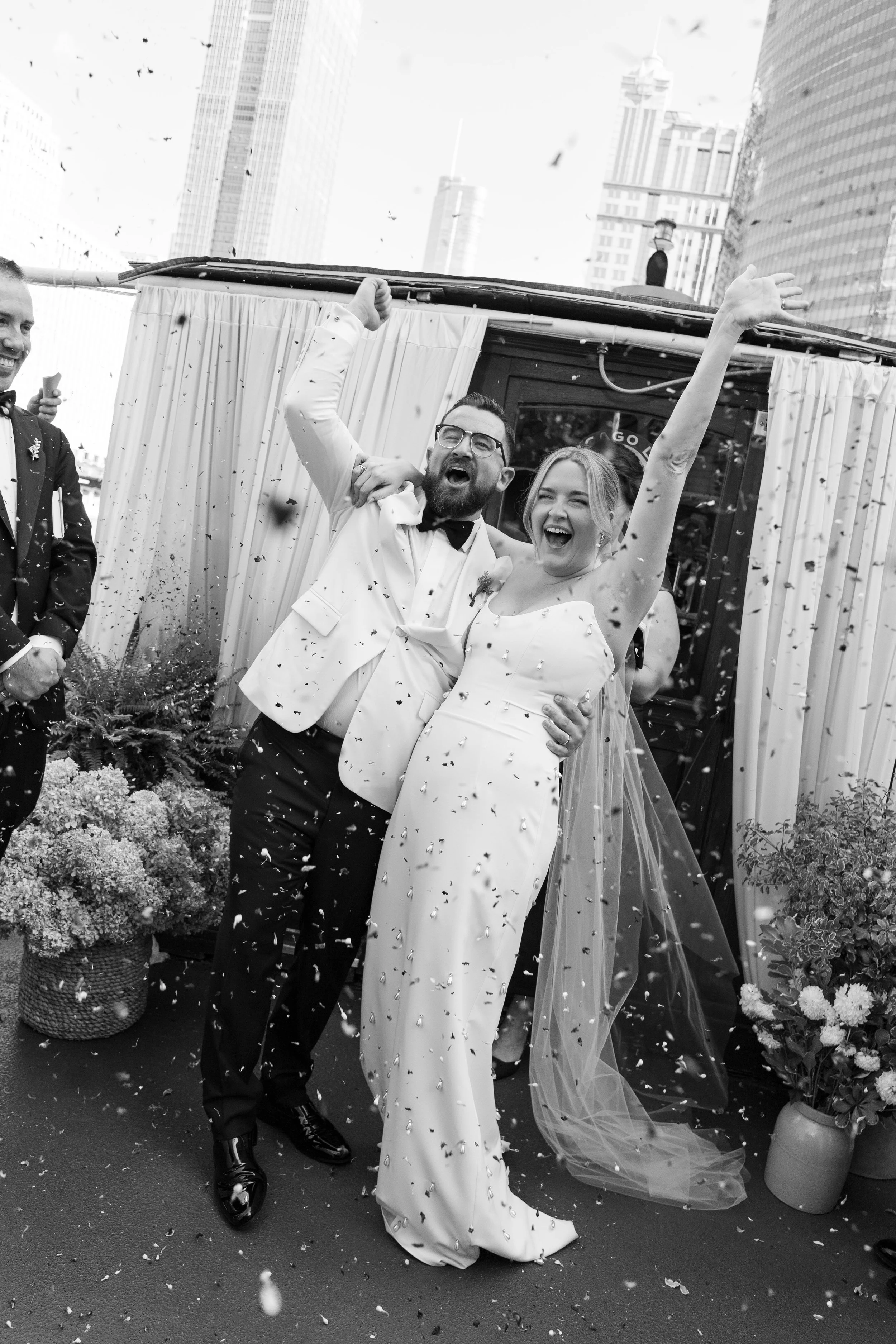 Bride and groom celebrate on Chicago Line Cruise for their wedding ceremony