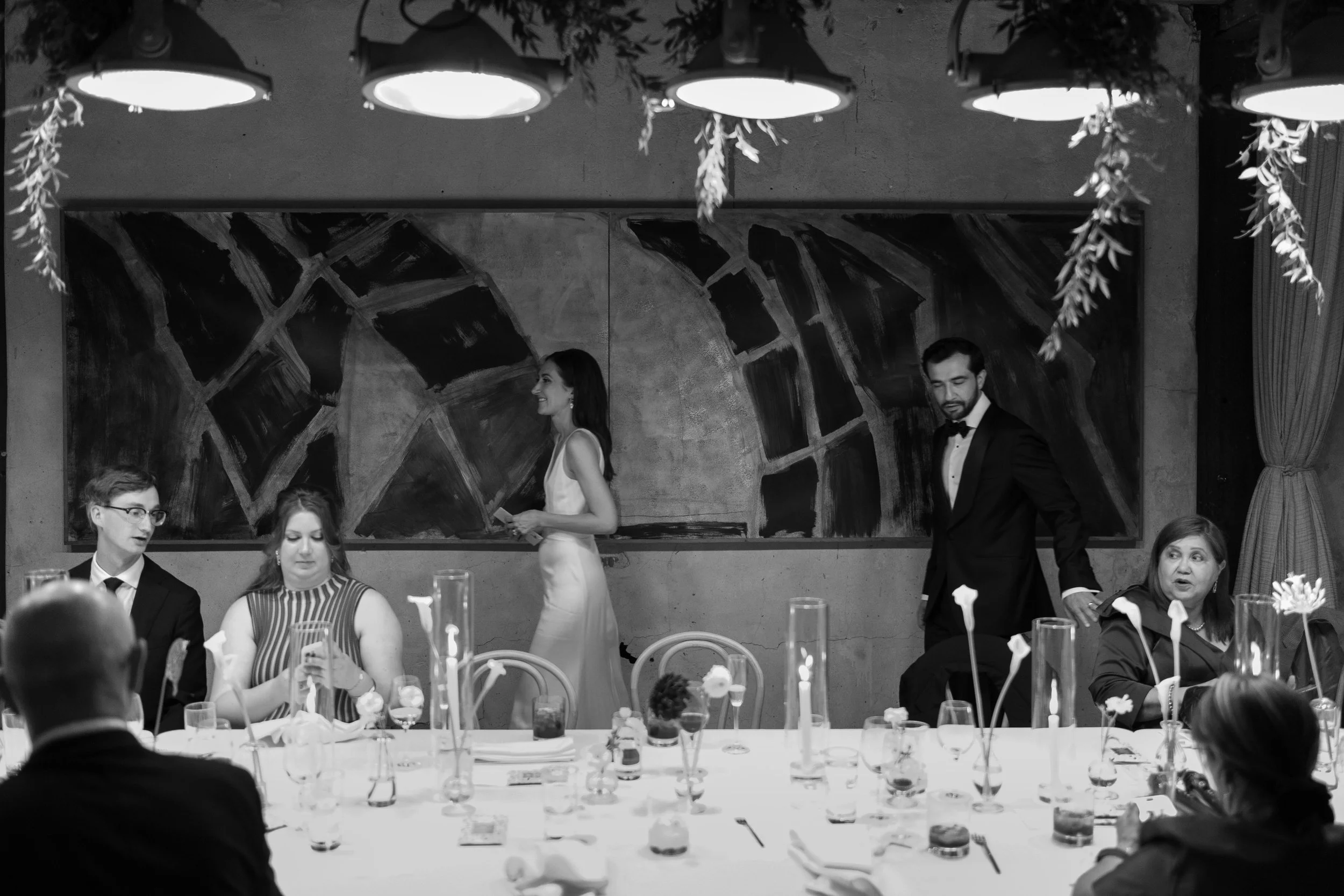 Bride and groom and guests at Charcoal Factory Loft wedding reception in Chicago