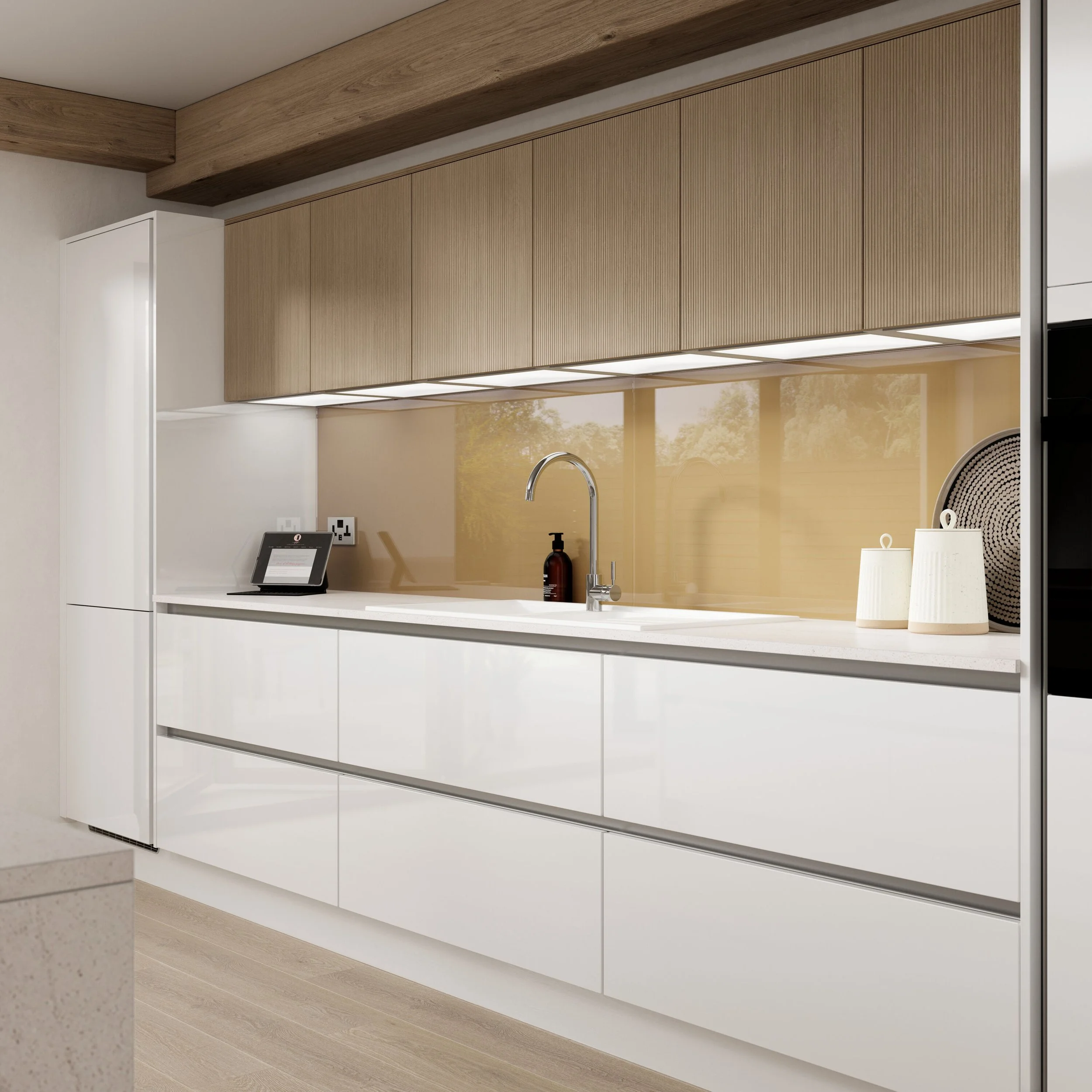 Modern kitchen with white cabinets, a beige backsplash, wooden upper cabinets, and a stainless steel faucet.