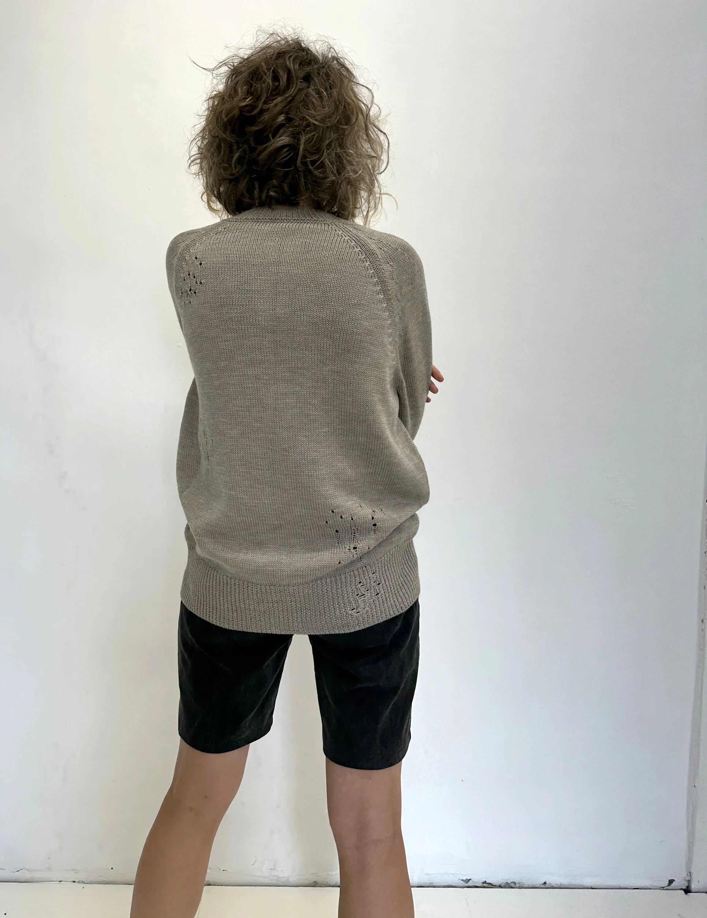 Distressed Wool Raglan Sweater — Oversized - side angle view
