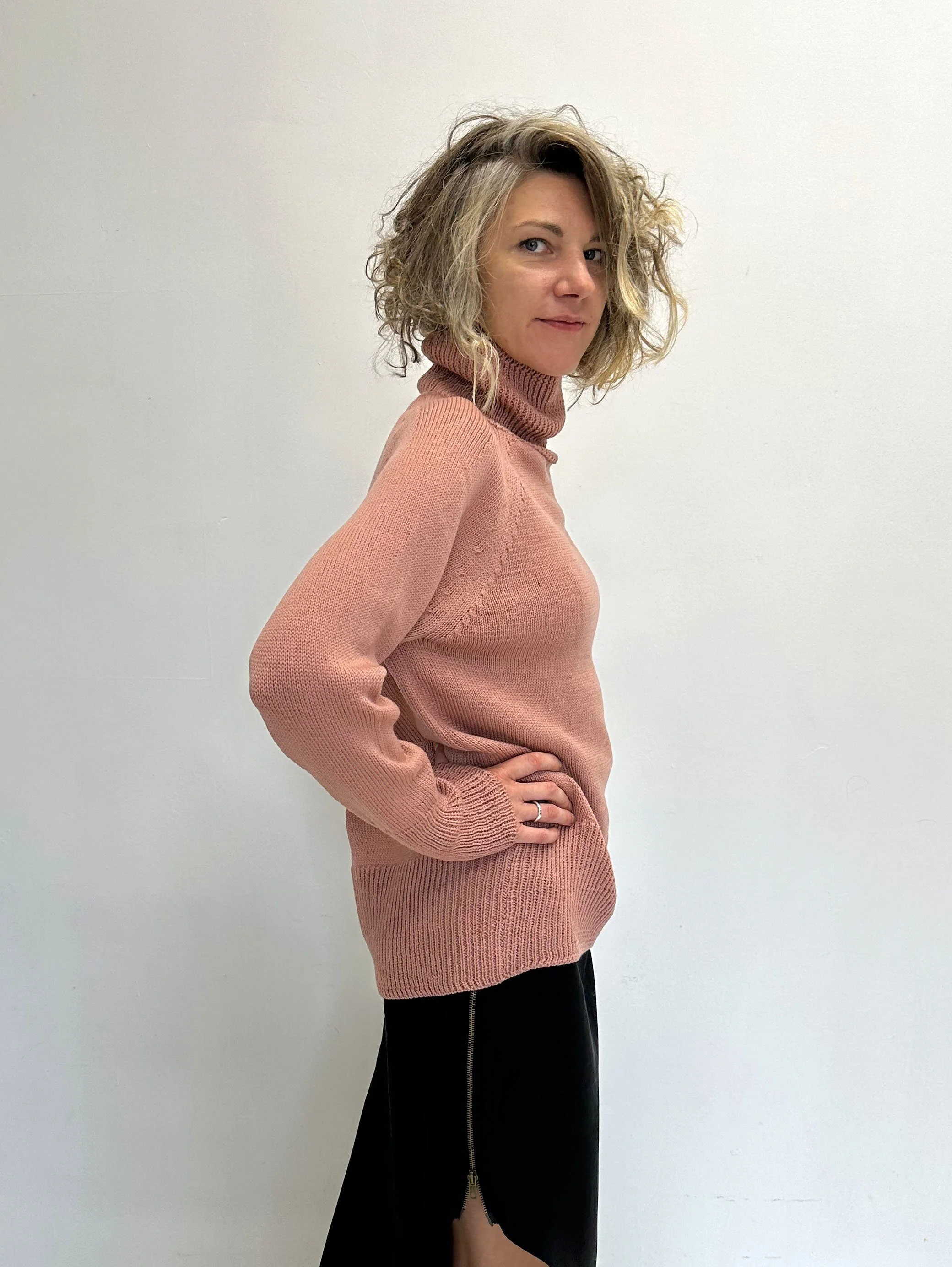 Oversized Merino Turtleneck — Dusty Pink Raglan - side angle view