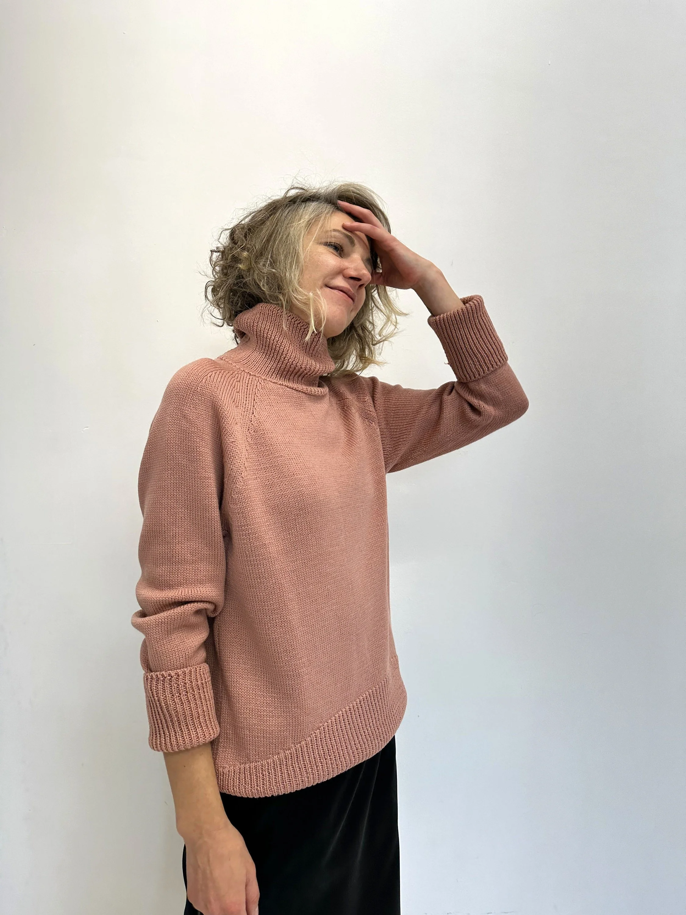 Oversized Merino Turtleneck — Dusty Pink Raglan - lifestyle styling view