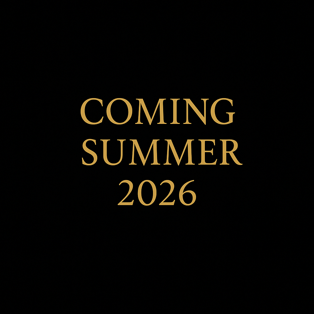 Text on black background announcing 'Coming Summer 2026' in gold font.