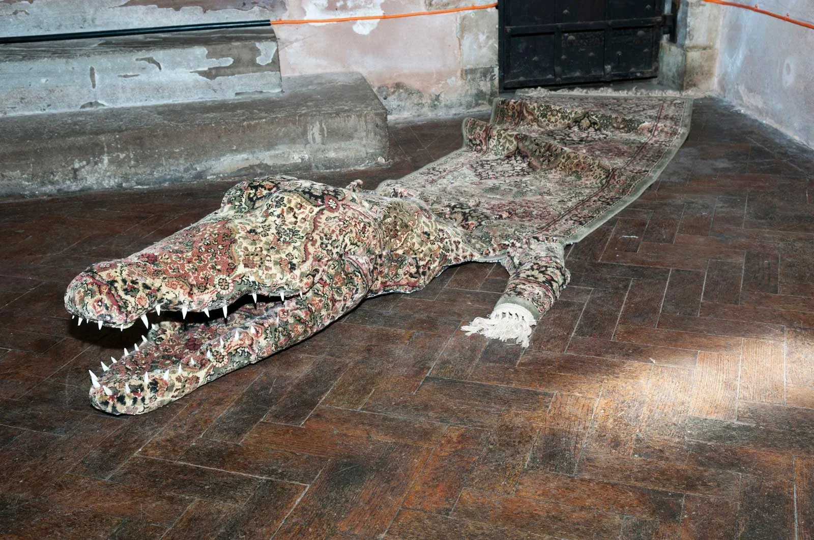 Persian Crocodile  
Dimensions variable 
Carpet and mixed media 
2011 (Nottingham Castle Museum and Art
Gallery collection)
 Images of this/other pieces in Make Believe: Re-imagining History and Landscape 2013, Nottingham
Castle Museum and Art Galle