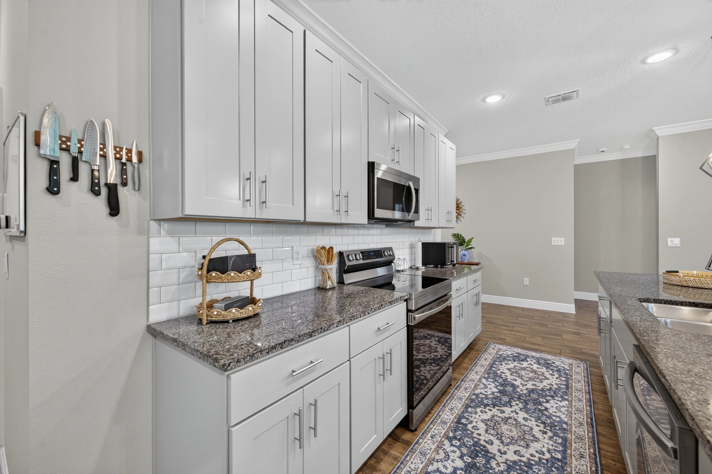 Kitchen offers abundance of cabinets and countertops 