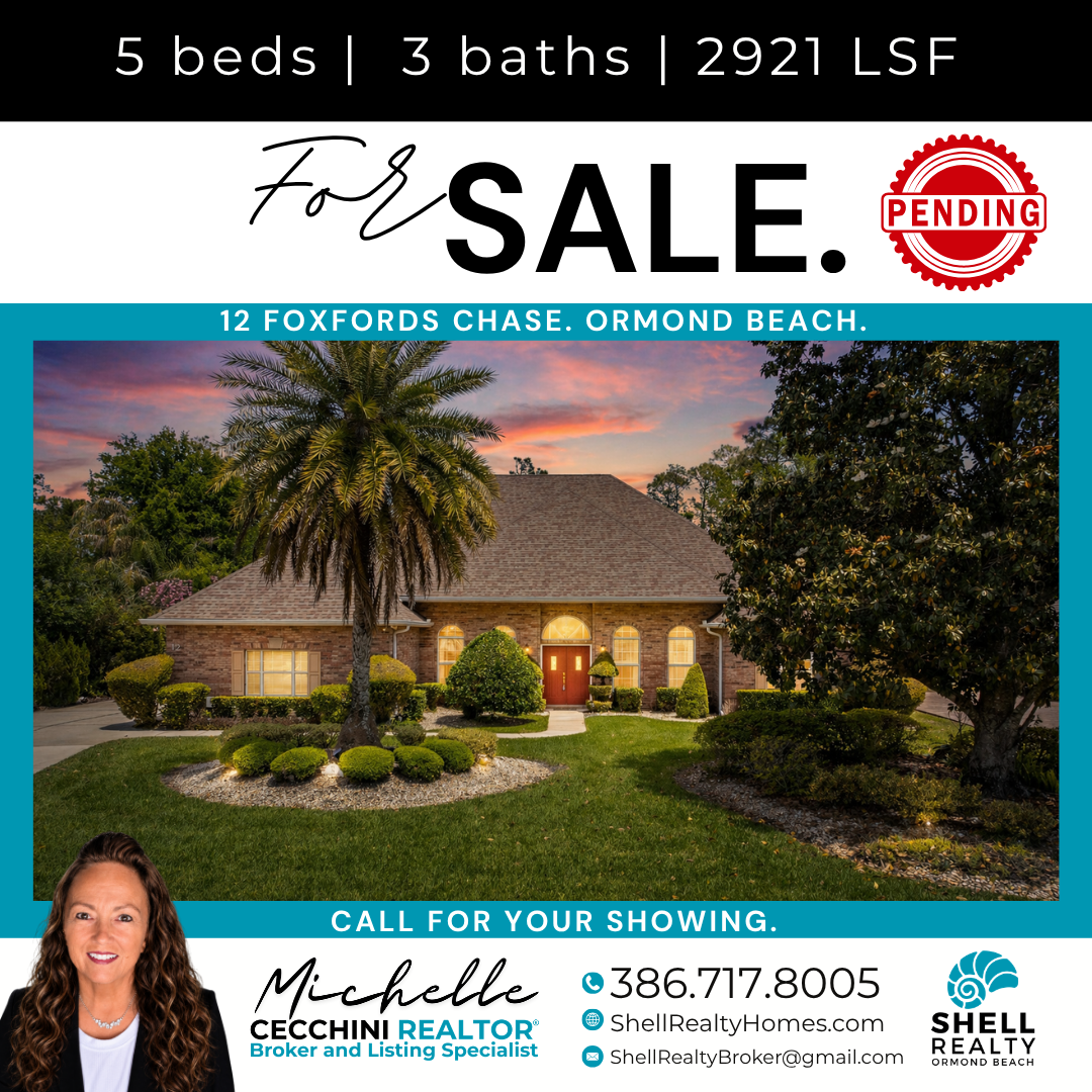 Real estate flyer advertising a home for sale at 12 Foxfords Chase in Ormond Beach with 5 bedrooms, 3 bathrooms, and 2921 square feet, featuring a front view of a brick house with a landscaped yard and sunset sky.