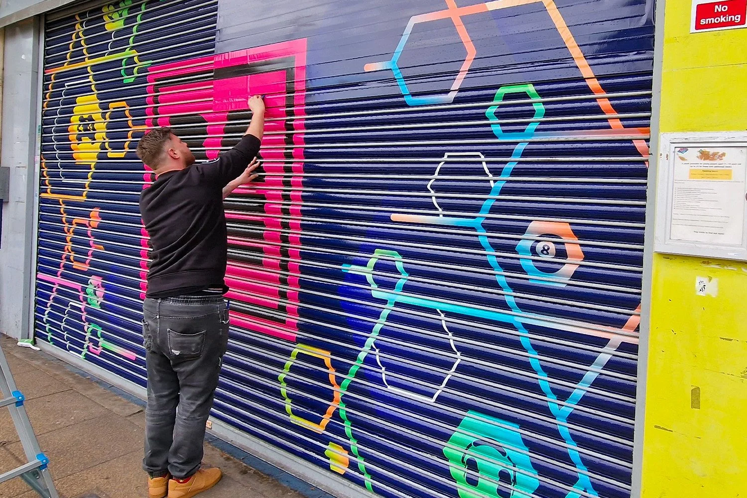  Vinyl Graphics  
Custom vinyl for signage, shutter wraps, vehicle branding and exhibition spaces.