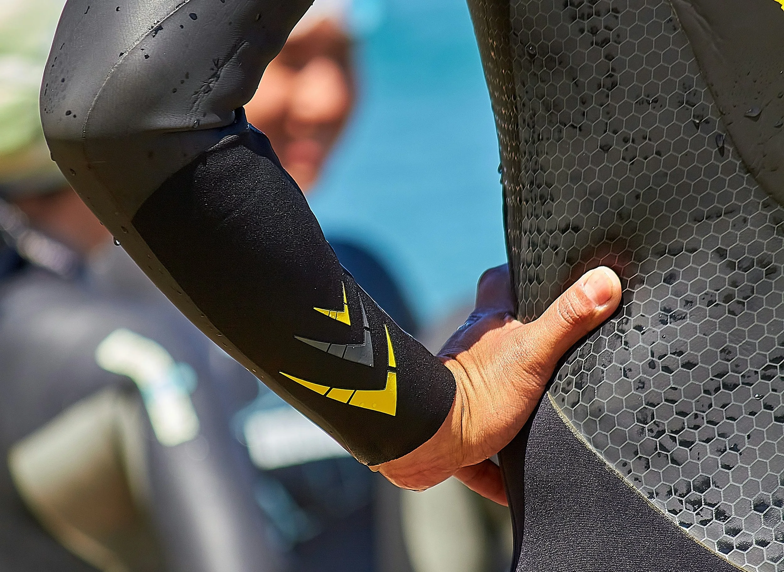 Close-up of open water wetsuit paneling and fit.