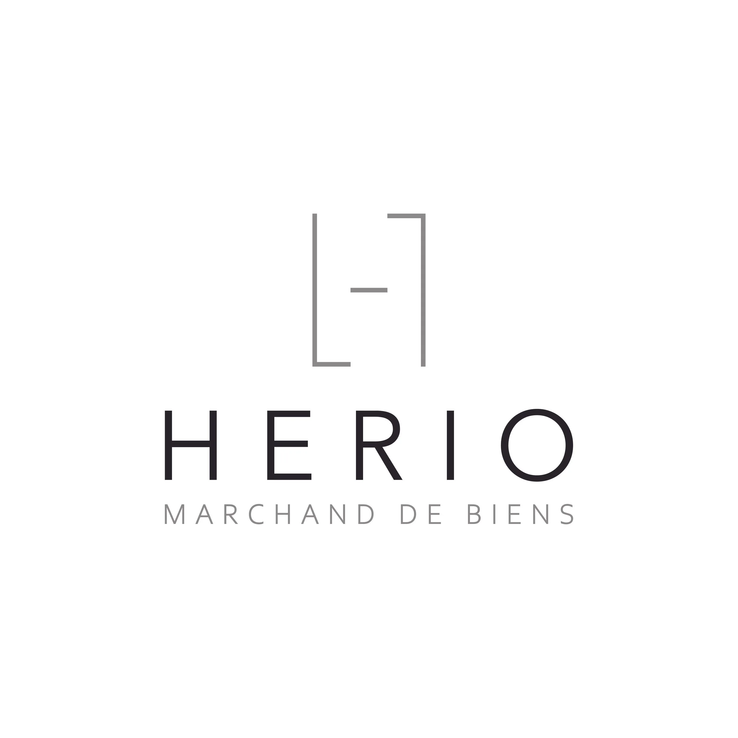 Logo de Herio, avec le slogan "Marchand de biens" en dessous.