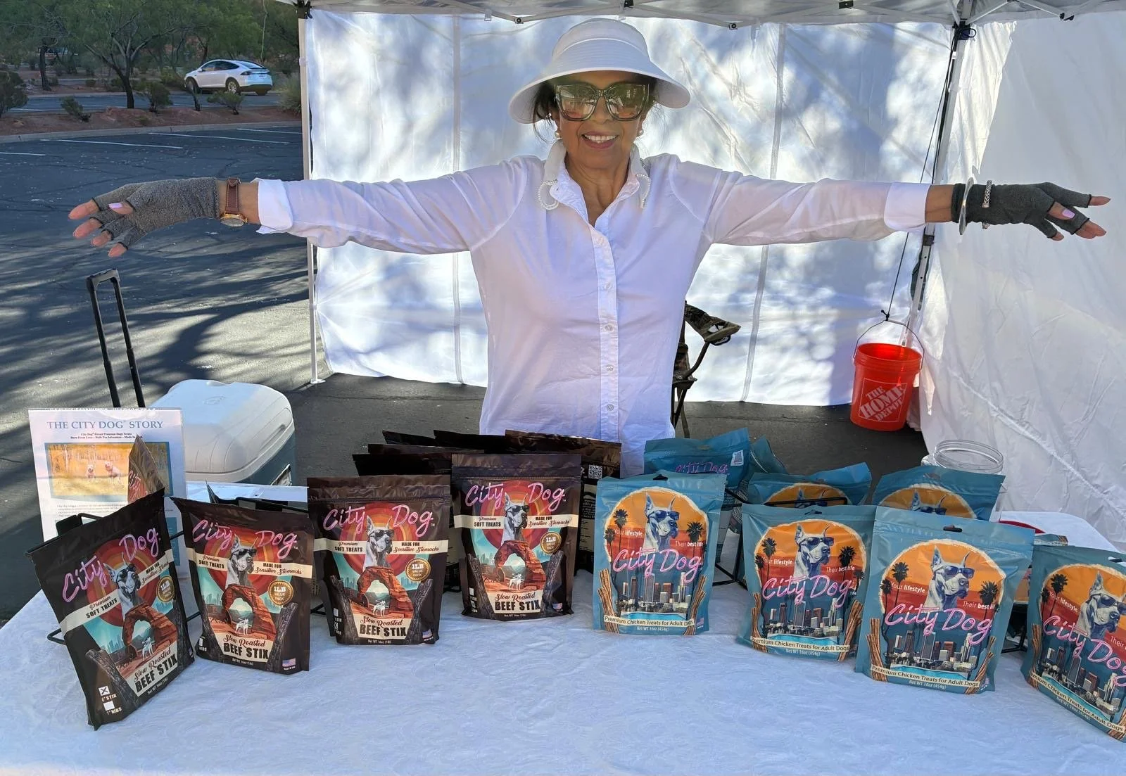 Co Founder Sandra Keck shows off City Dog Premium Chicken treats and Show Roasted Beef Stix. Available online or at Tuacahn market in St. George Utah