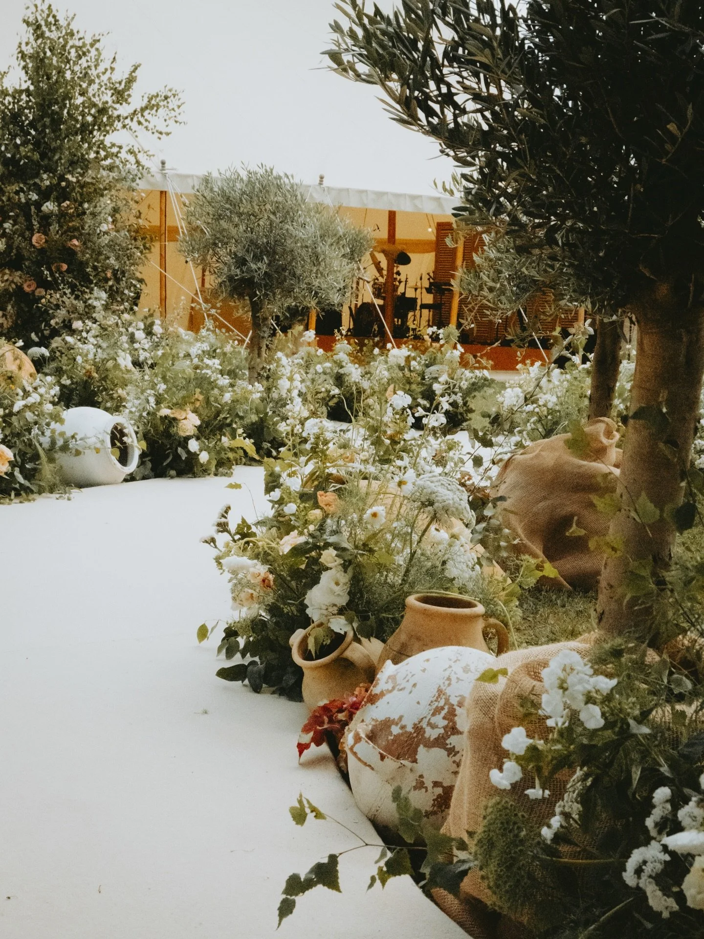A Walkway of Dreams 
Created for the utterly fabulous Becca &amp; Harry last summer, and still feeling all the love now for this fabulous wedding so thank you 🤍

What began at sunrise as meadows and olive urns on the far side of the lake for the cer