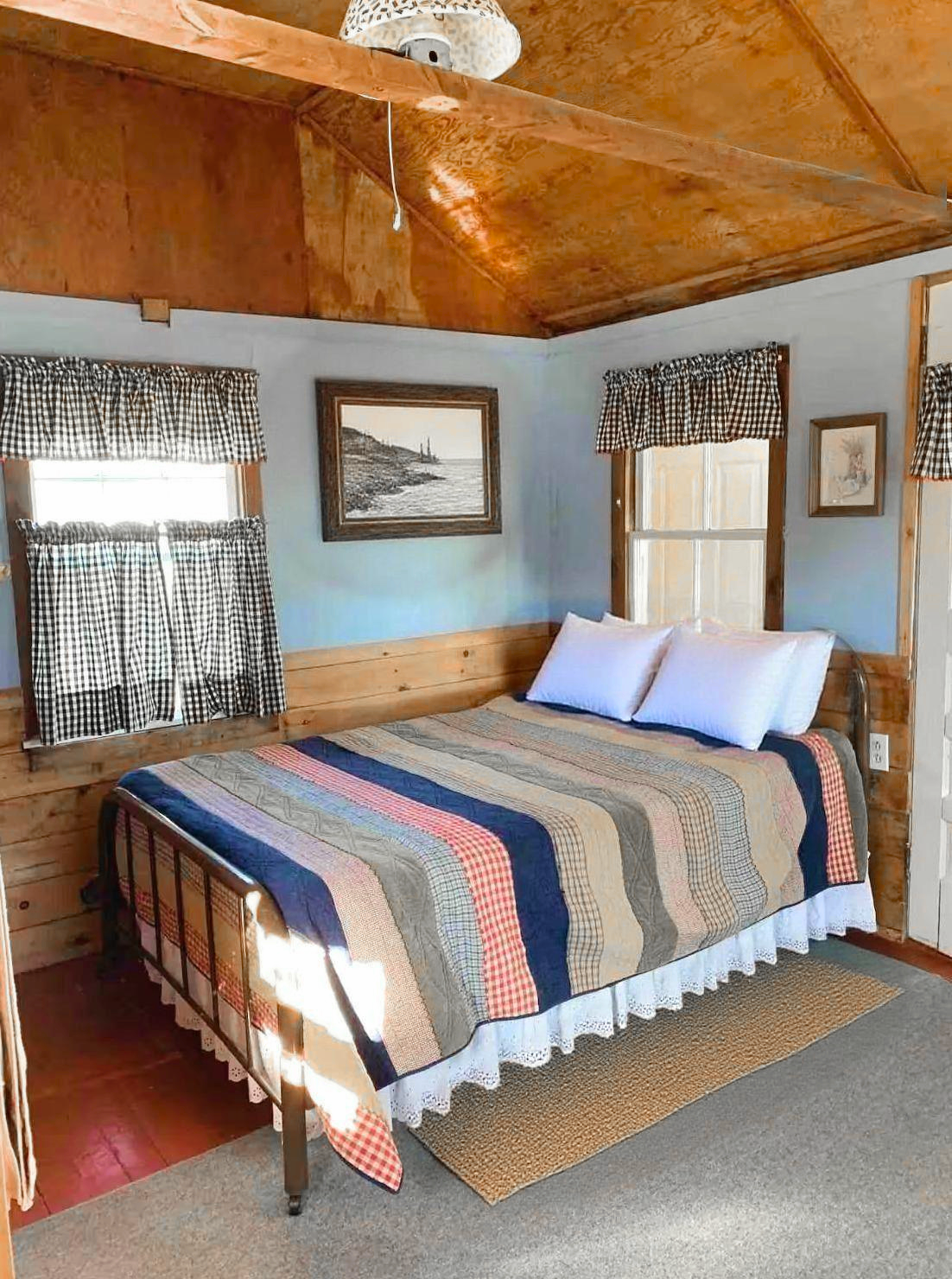 Queen bedroom in pet friendly cabin overlooking Flanders Bay