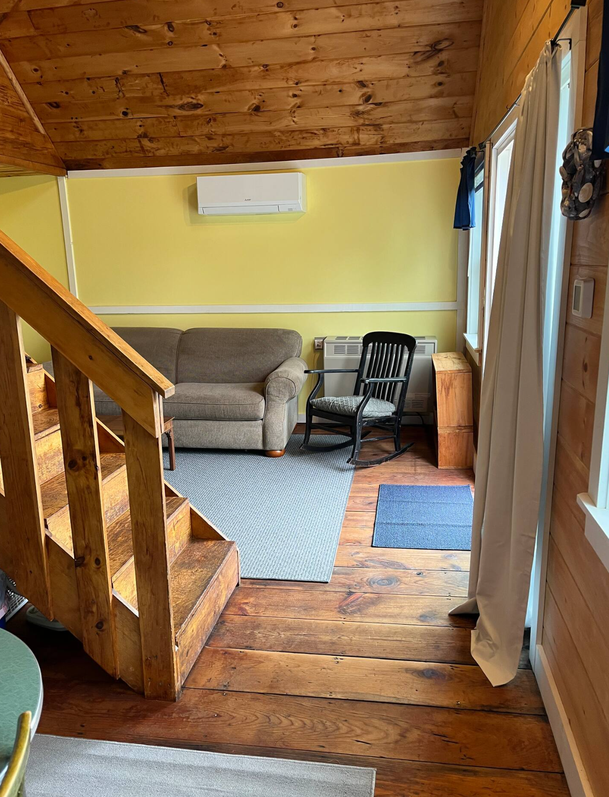 Open living area in chalet near Acadia with cathedral ceilings