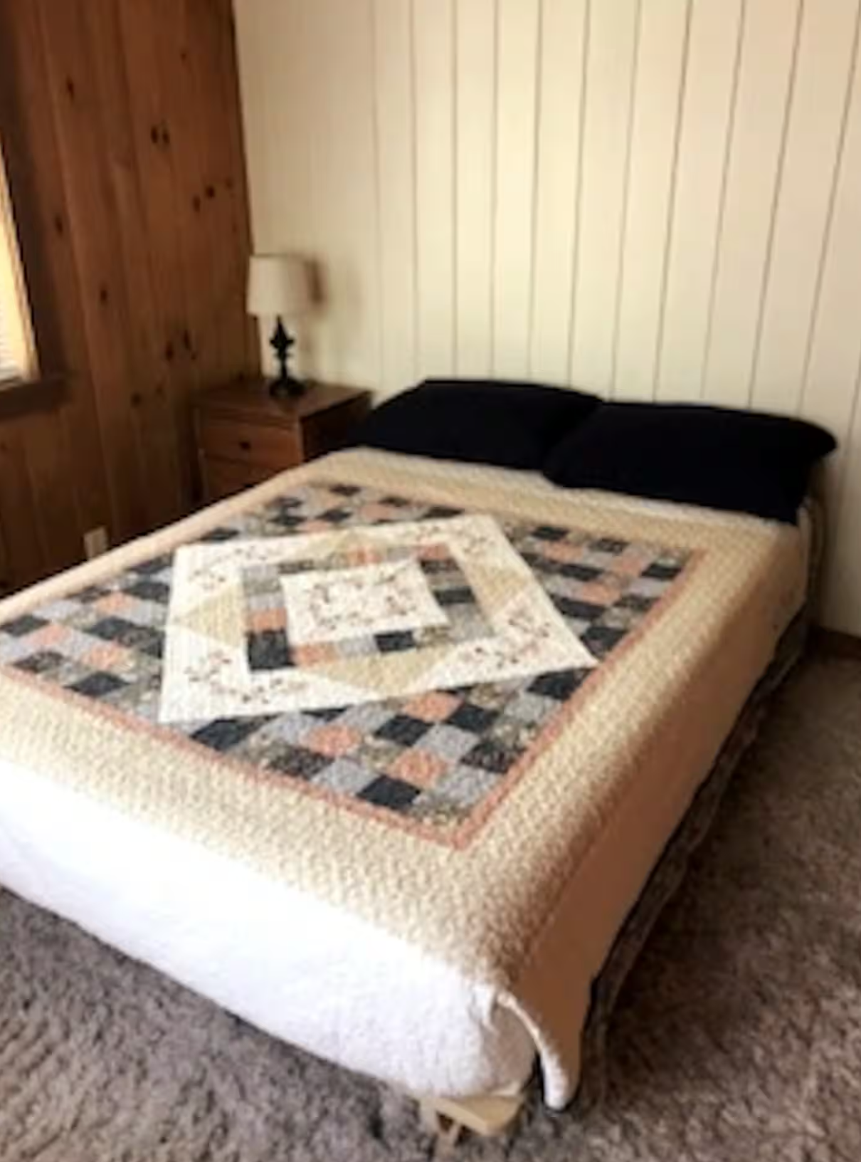 Queen bedroom in waterfront cottage on Taunton Bay