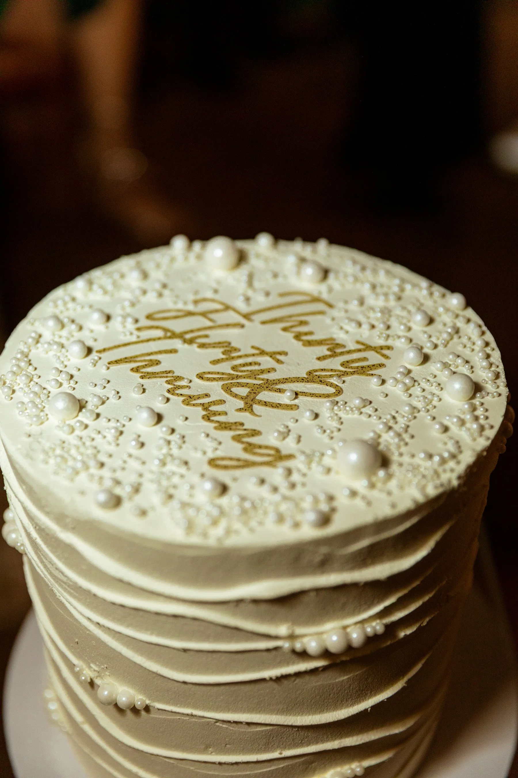 cake with pearls and personalised topper
