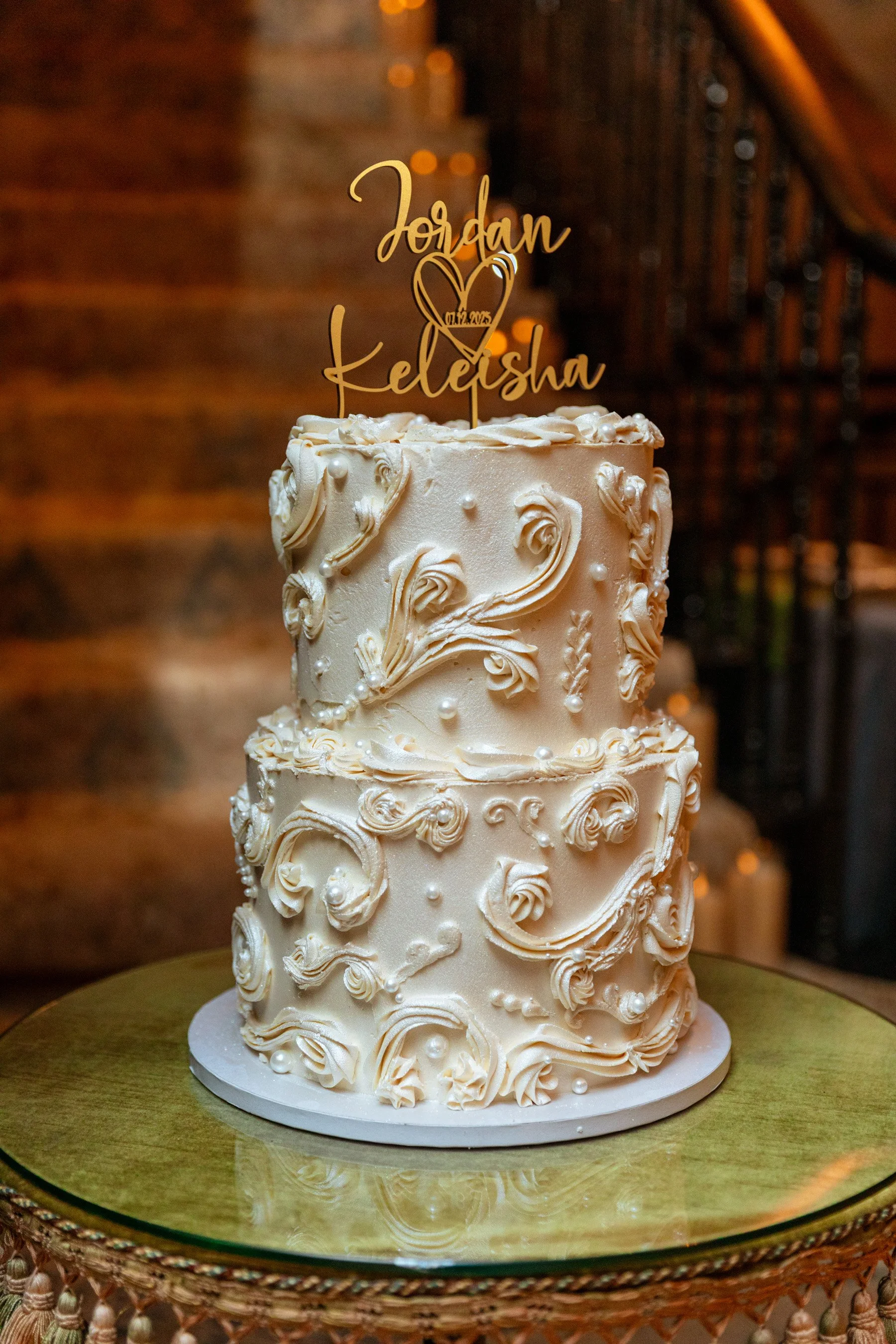 tiered wedding cake with custom topper