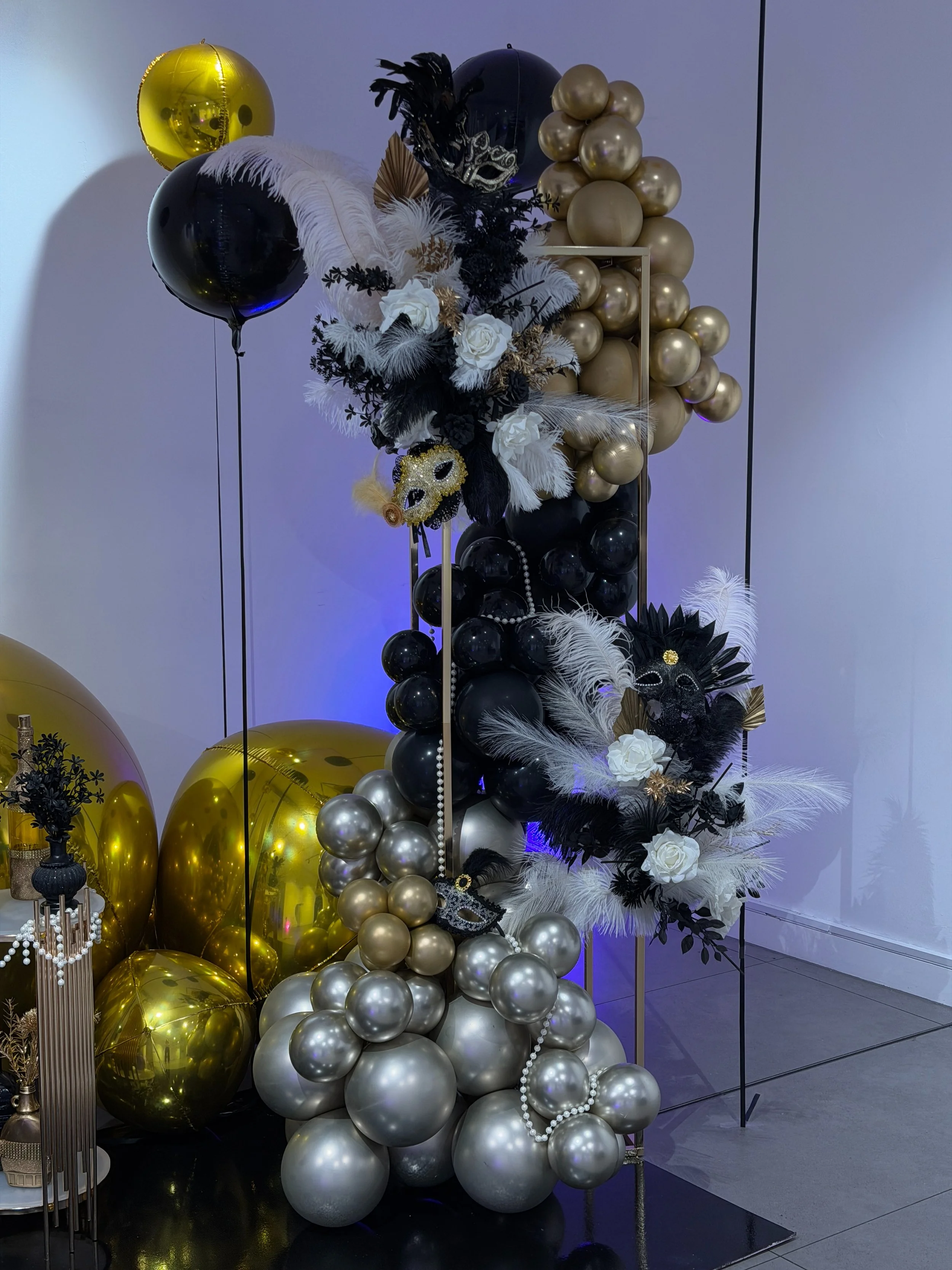 gold orb balloons and balloons and masks