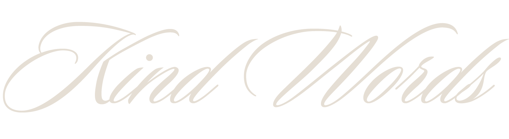The phrase 'Kind Words' written in elegant, cursive script with a light color on a dark background.