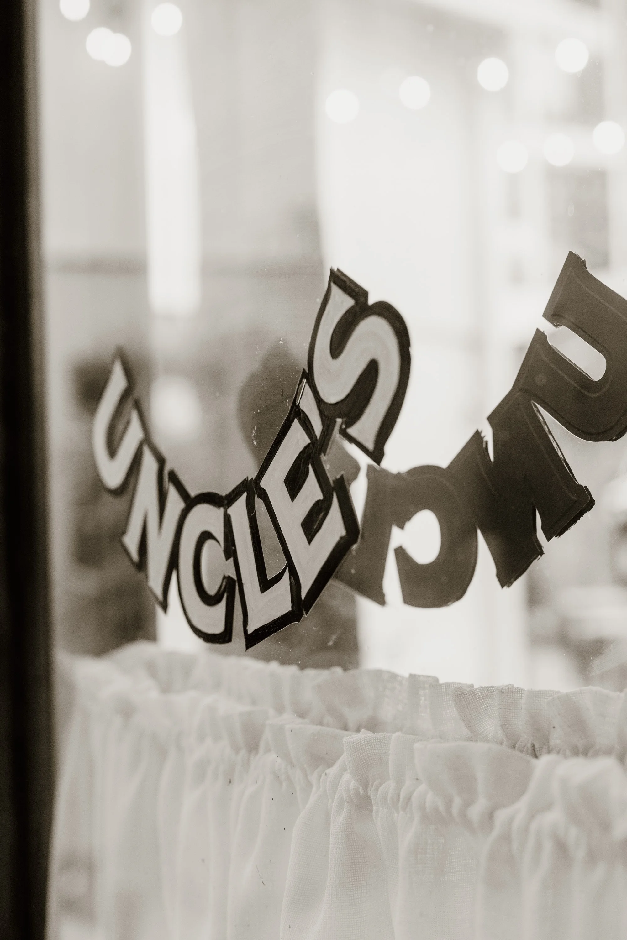 Restaurant signage seen through window, Colombo, Sri Lanka