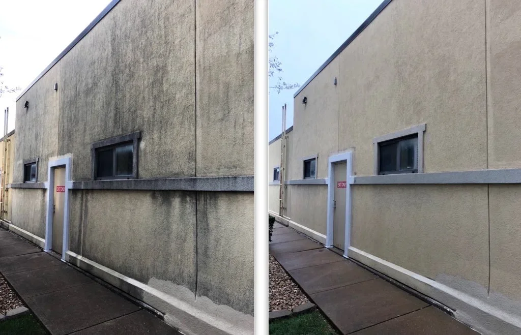 Side-by-side comparison of building exterior, left side shows dirty, stained gray wall, right side shows clean, freshly painted or cleaned beige wall with a small door and windows.