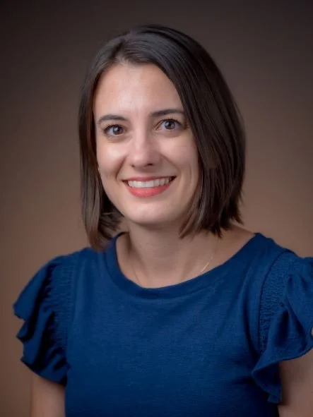 Headshot of Ashley Ermer smiling