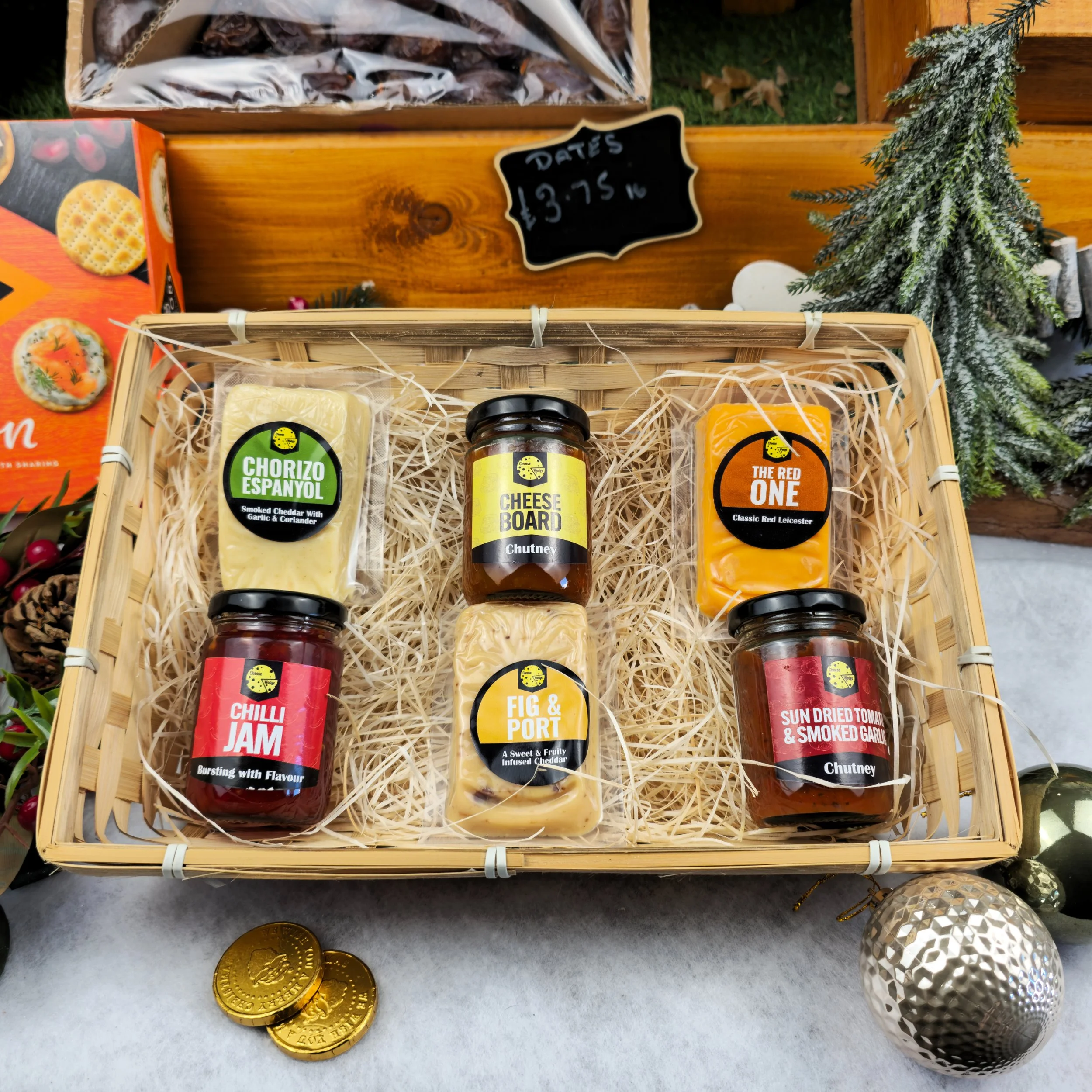 An elegant gift set of locally sourced cheeses and chutneys nestled in straw. The careful balance of colour and light captures the charm of artisan production. This composition celebrates the artistry of small-batch making—a sensory portrait of craft