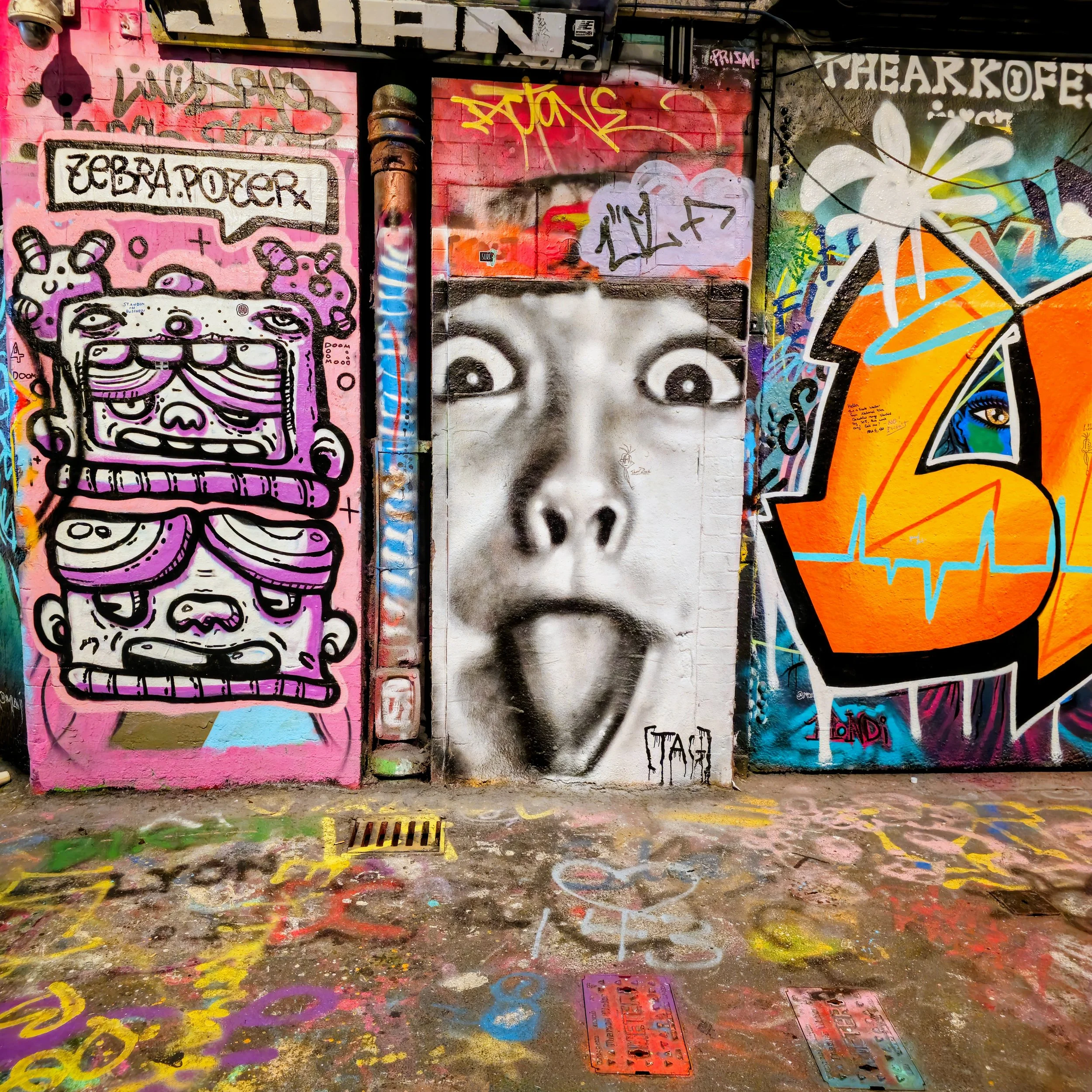 Playful and expressive street art mural combining monochrome realism with colourful cartoon graffiti. Photographed by Daines Royal Limited, this image embodies creative freedom and the company’s passion for producing accessible, modern marketing cont