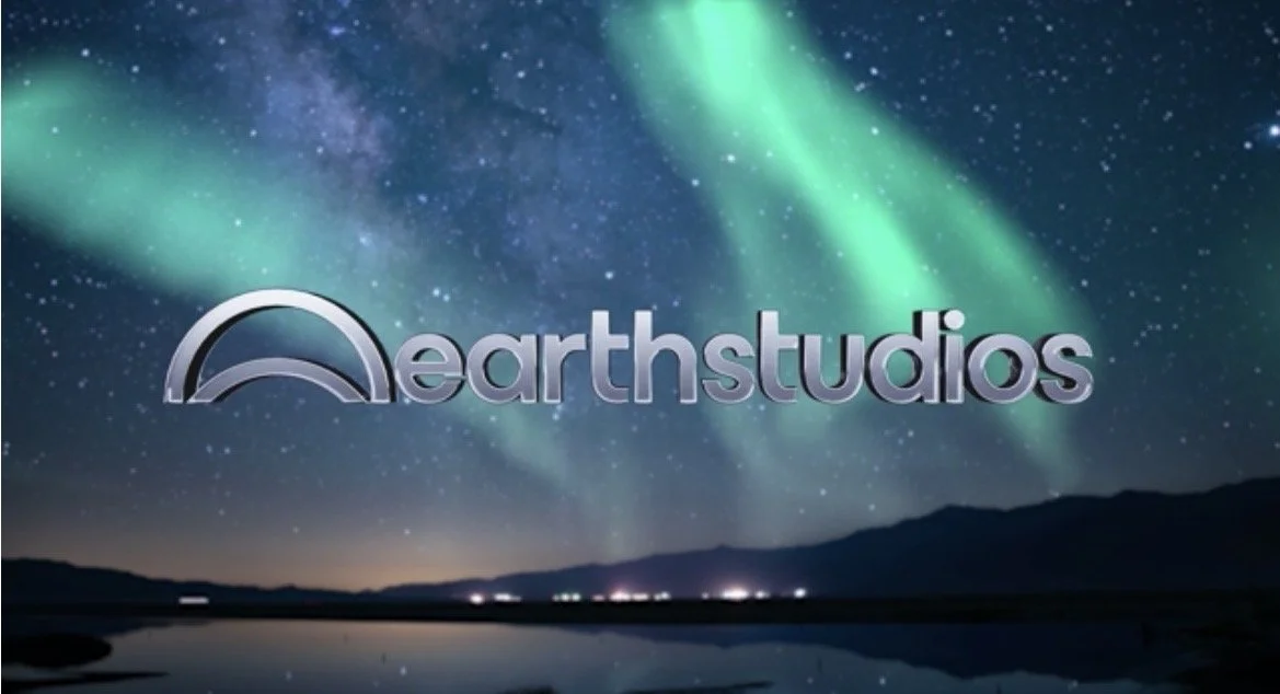 Earth Studios logo – night sky with green aurora borealis