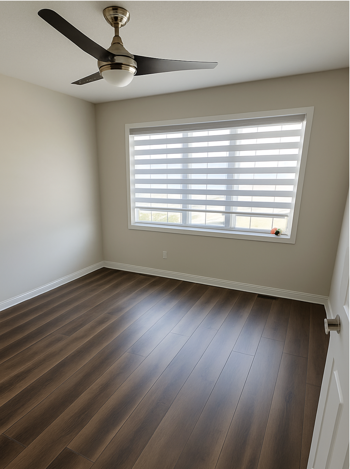 Bathroom with marble wall tiles, bathtub, and a dark wood floor.