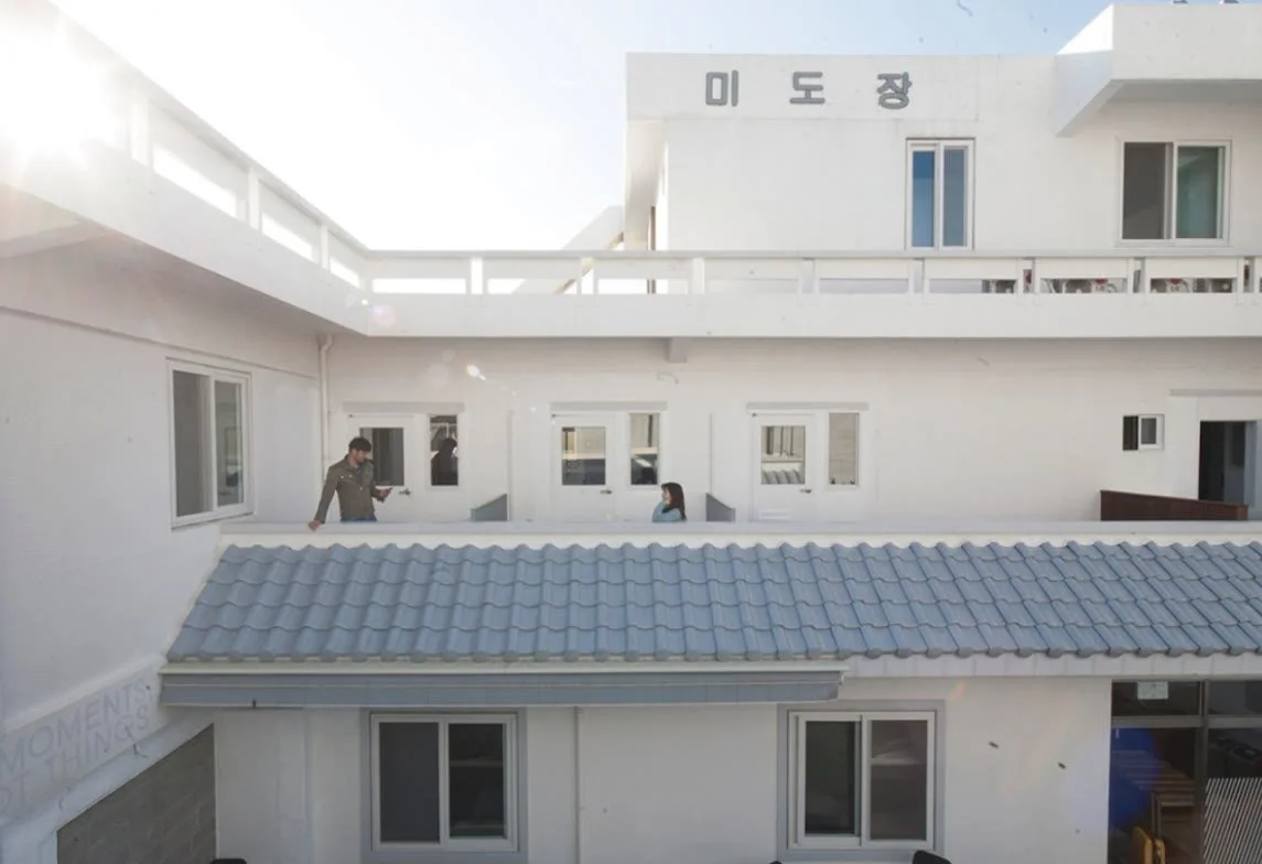 Completed exterior with the light gray roof and the original Mido-jang lettering kept