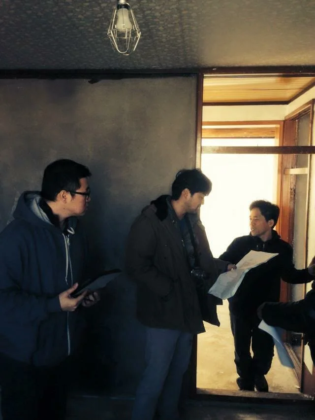 Discussing the remodeling plan on site